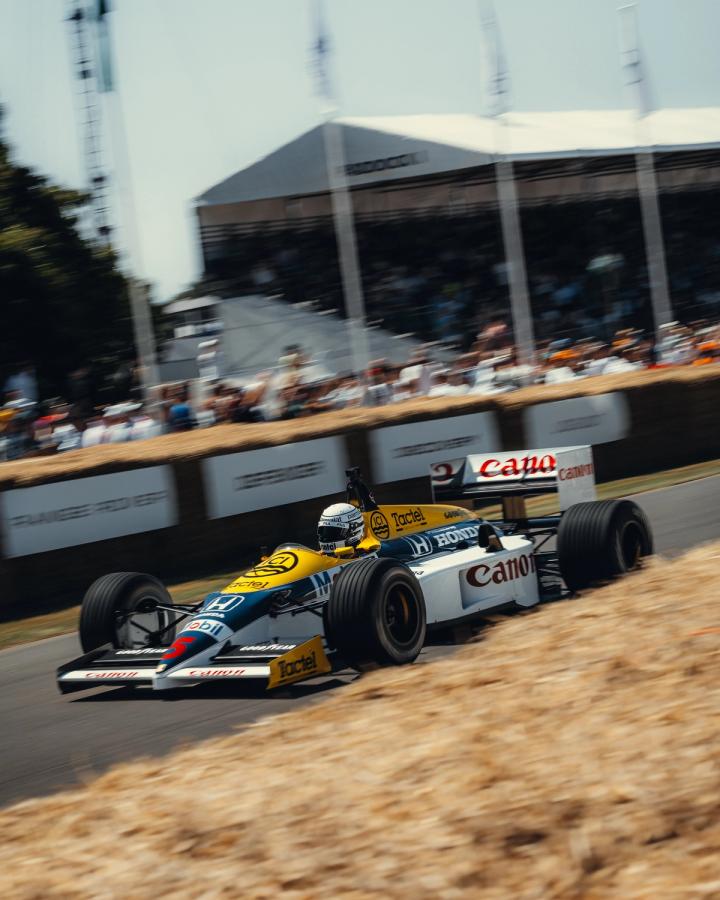 Riccardo Patrese driving the FW11 at the 2025 Goodwood Festival of Speed