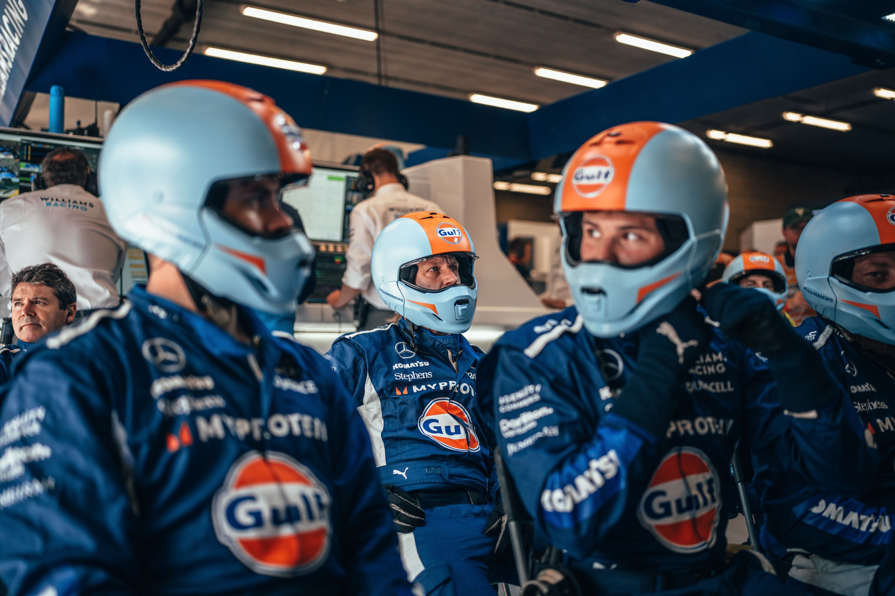 The pit crew get ready for action.