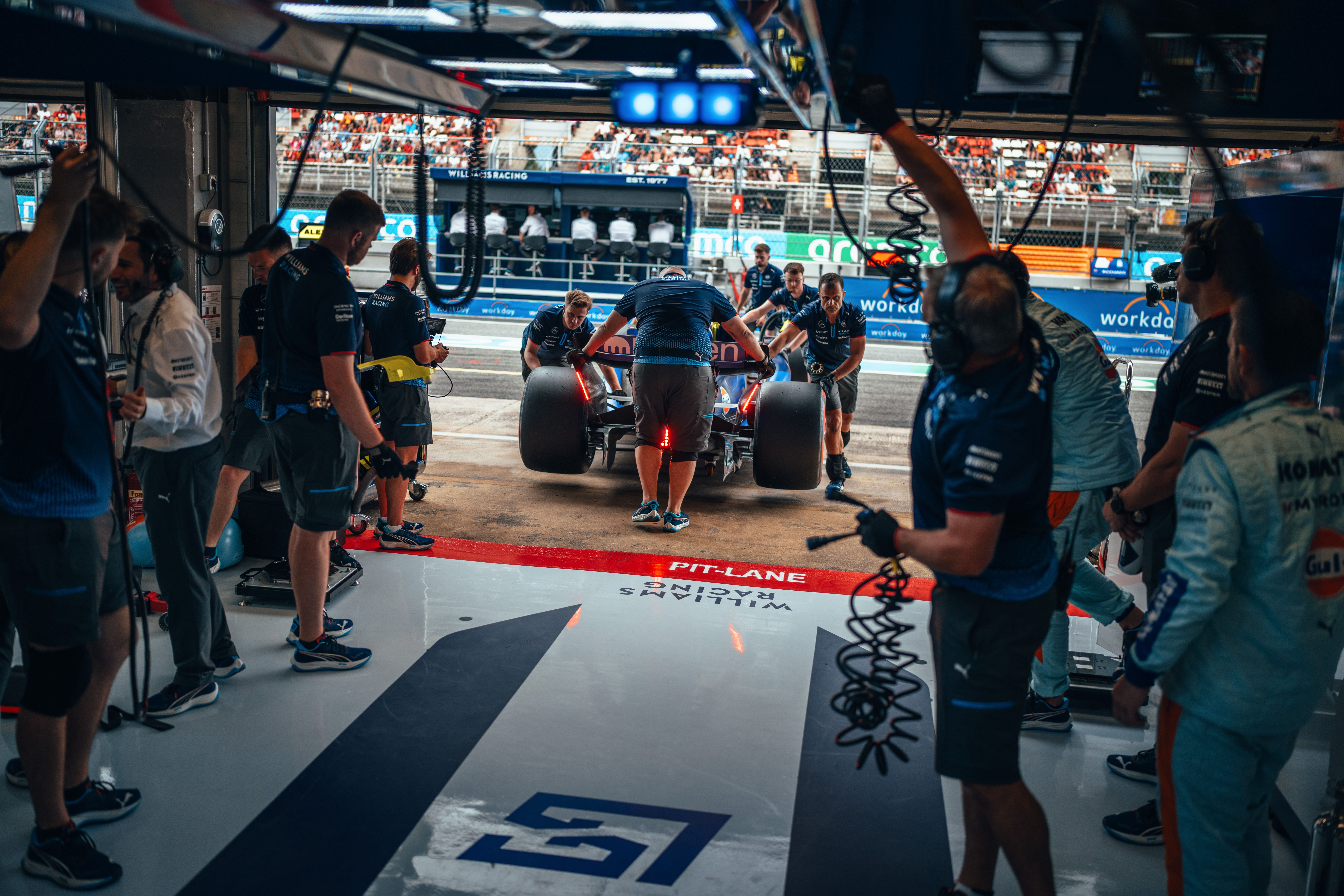 Sarge backs into the garage.