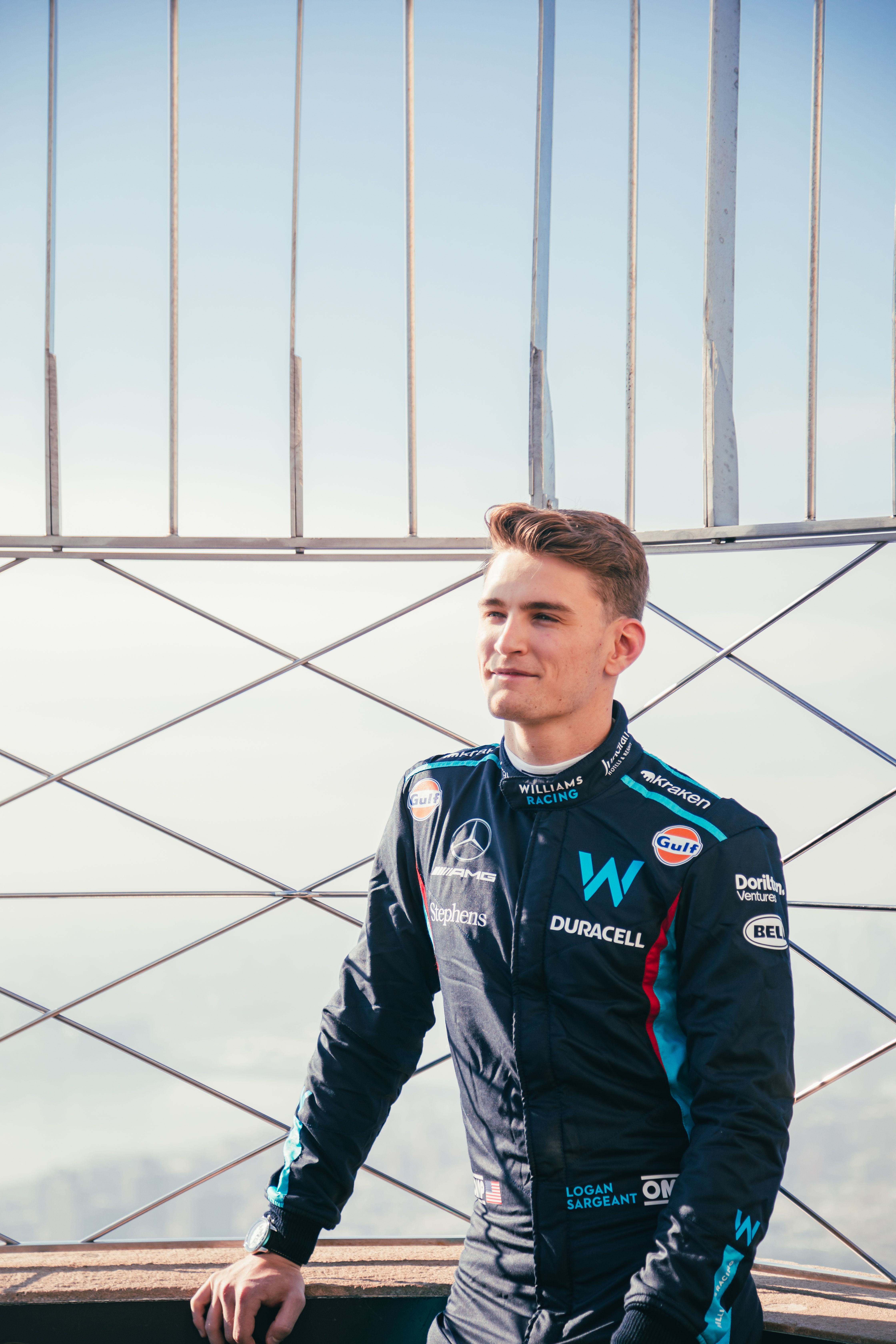 Naturally, he also put his race suit on.