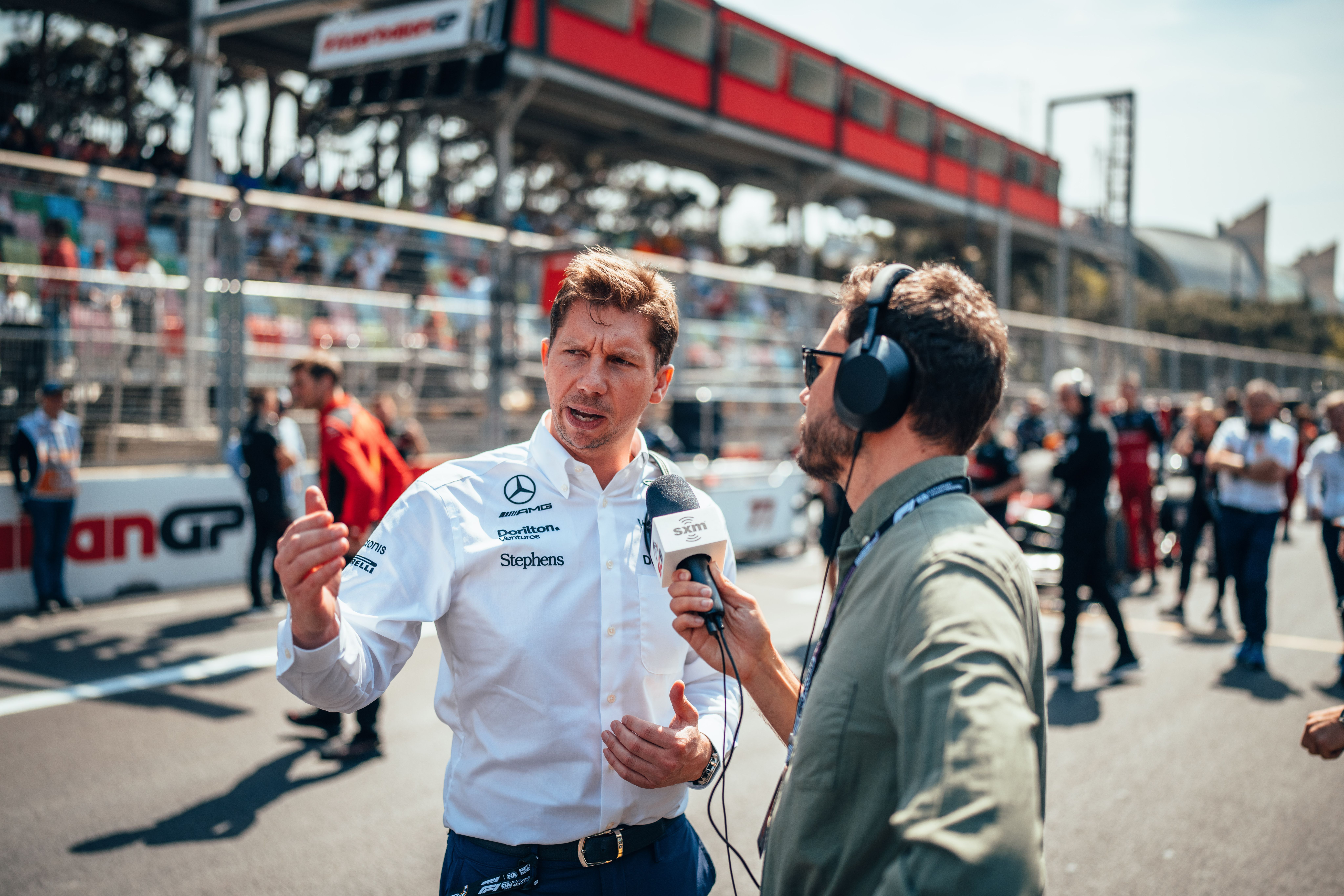 James faces the media on the grid.