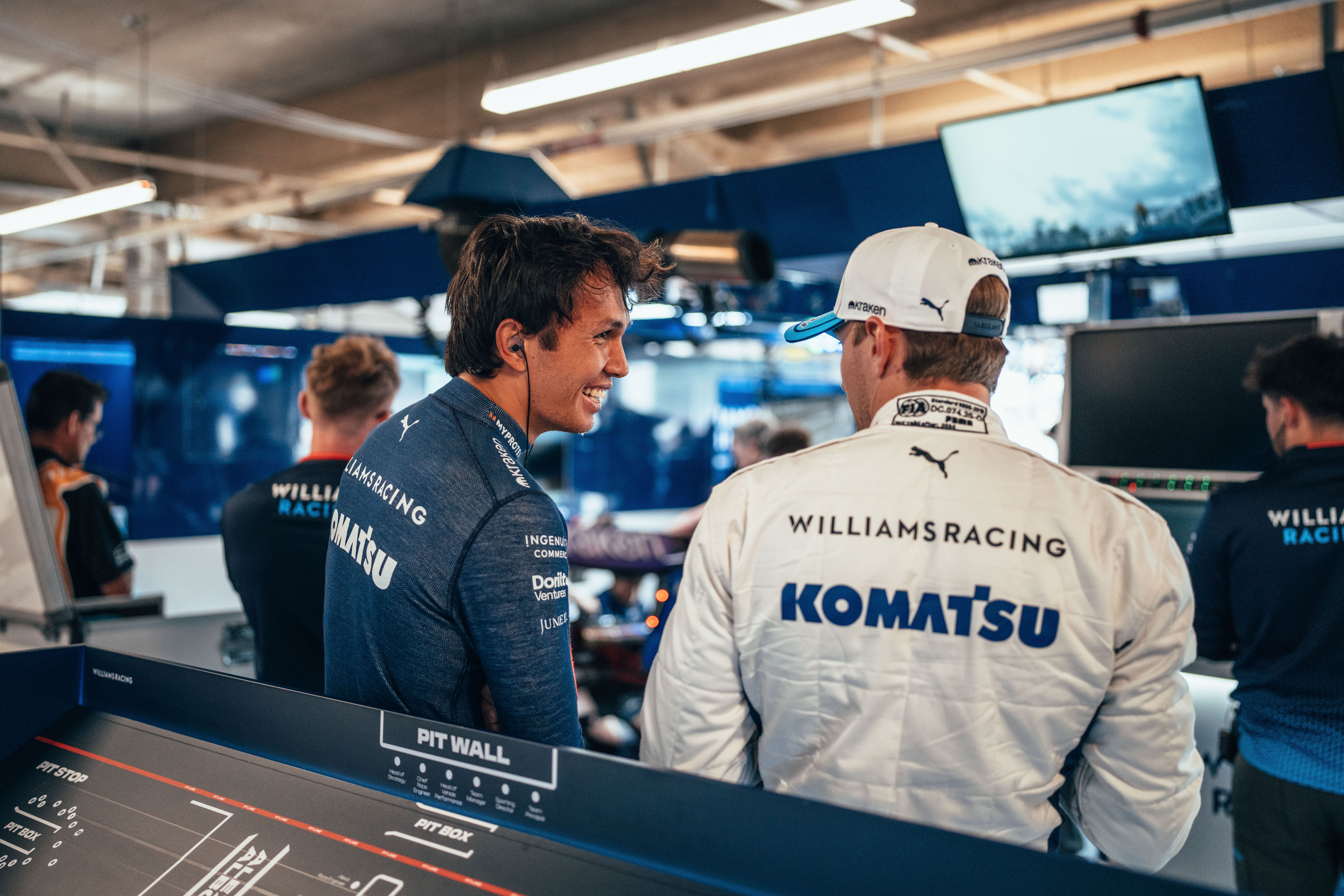 All smiles at the back of the garage