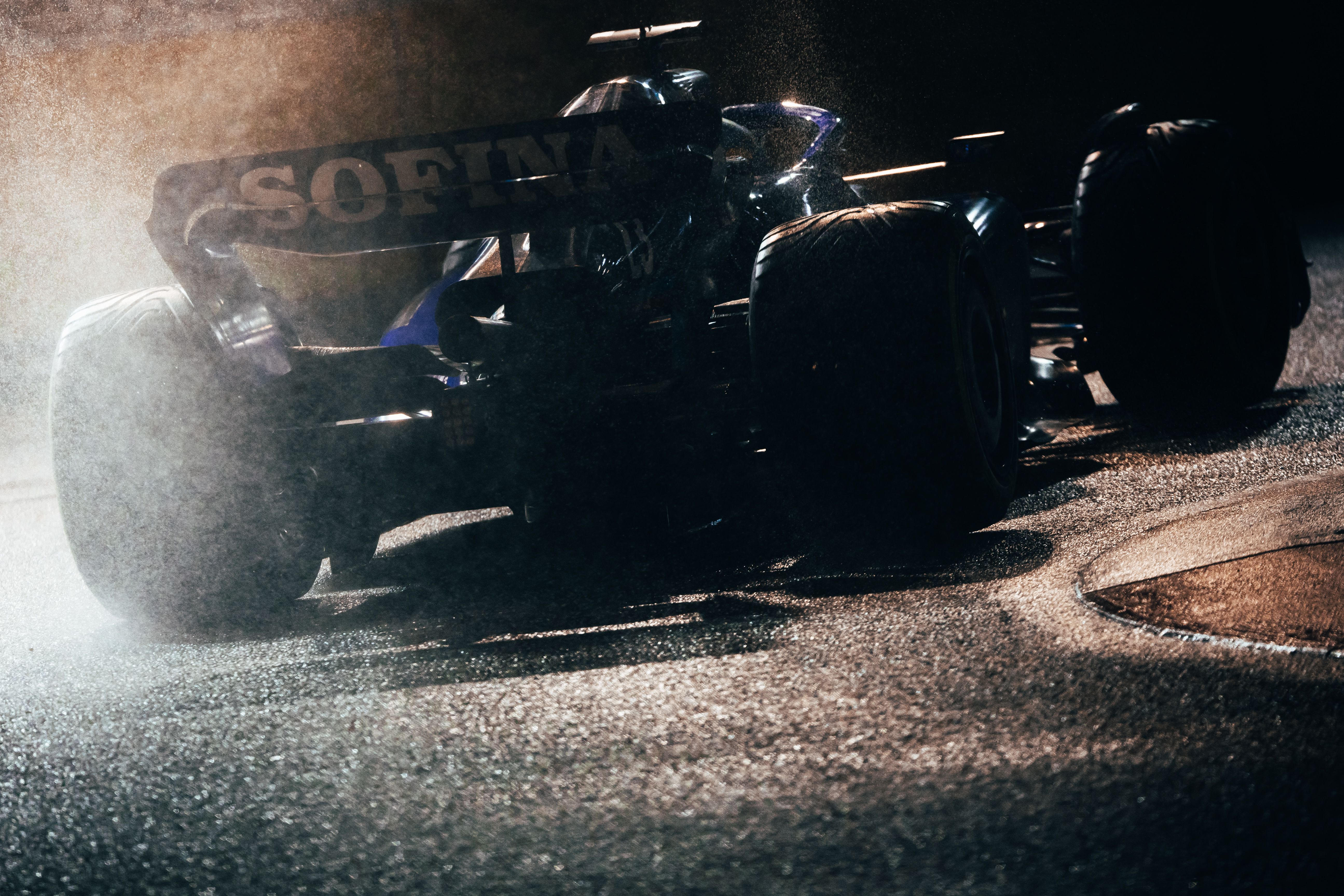 Rain + FW44 + Night race = What. A. Shot. 