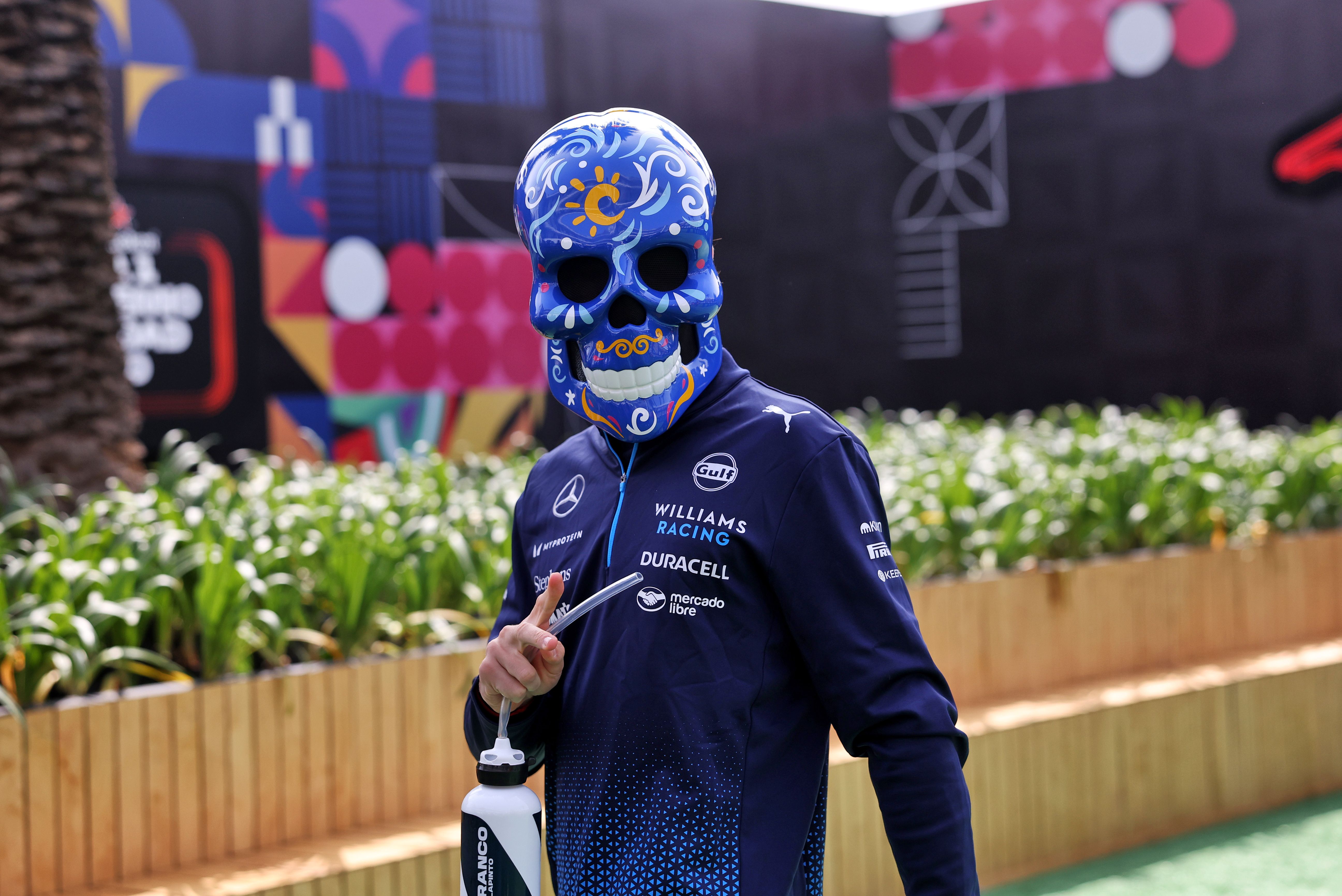 Franco smiles at the camera... we think...