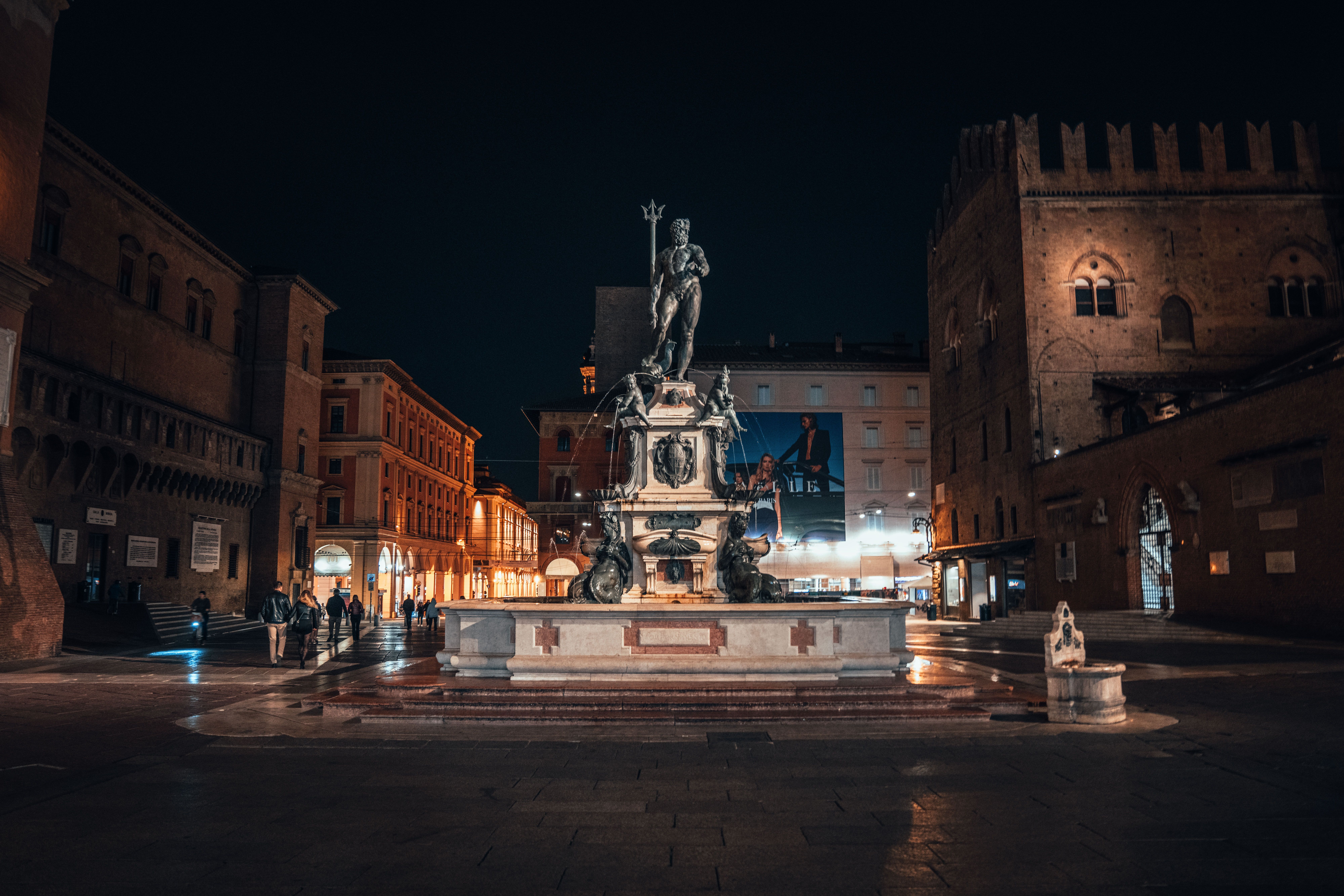 Tourist duties at Bologna’s Fountain of Neptune