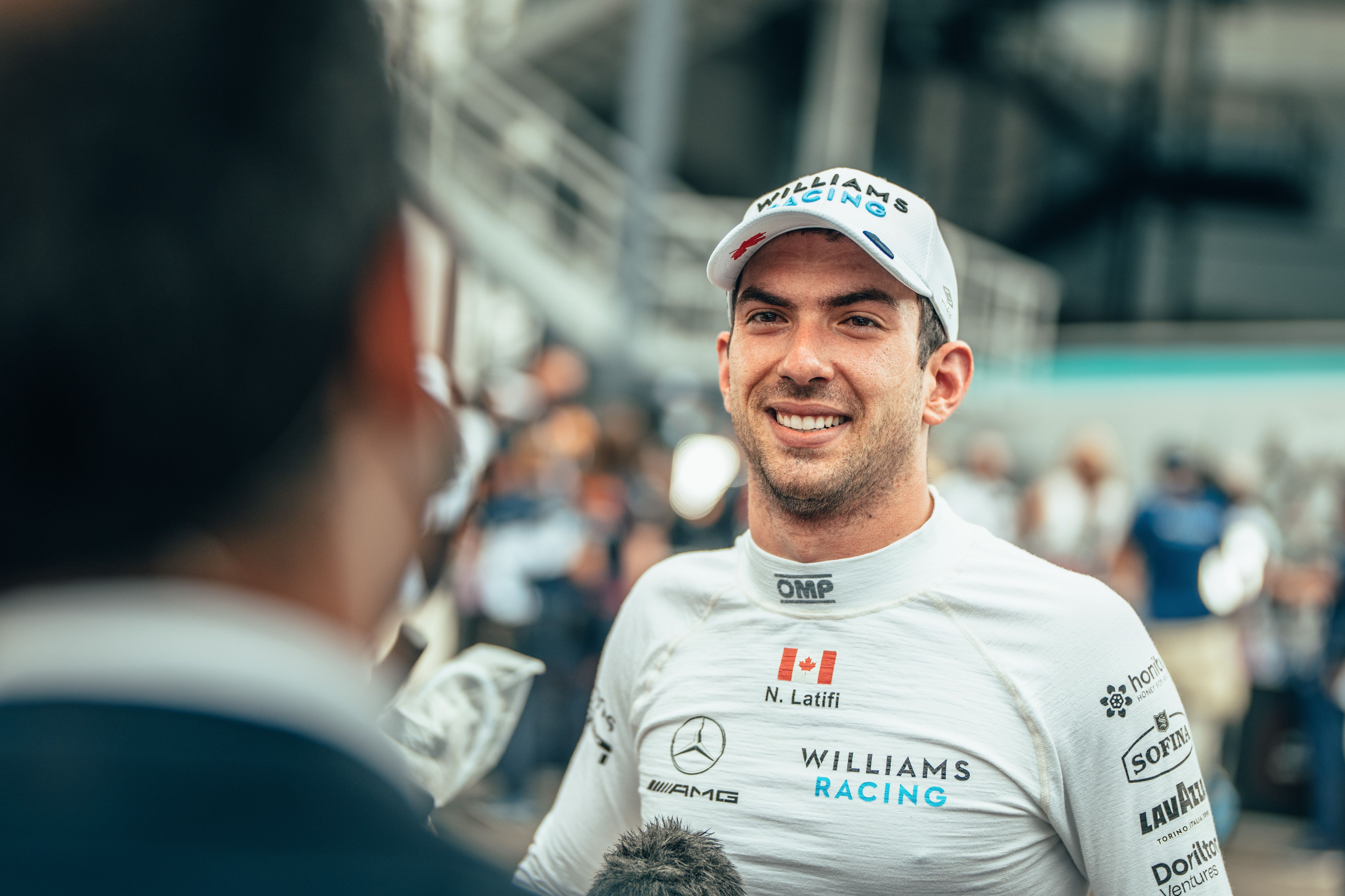 All smiles in the press pen.