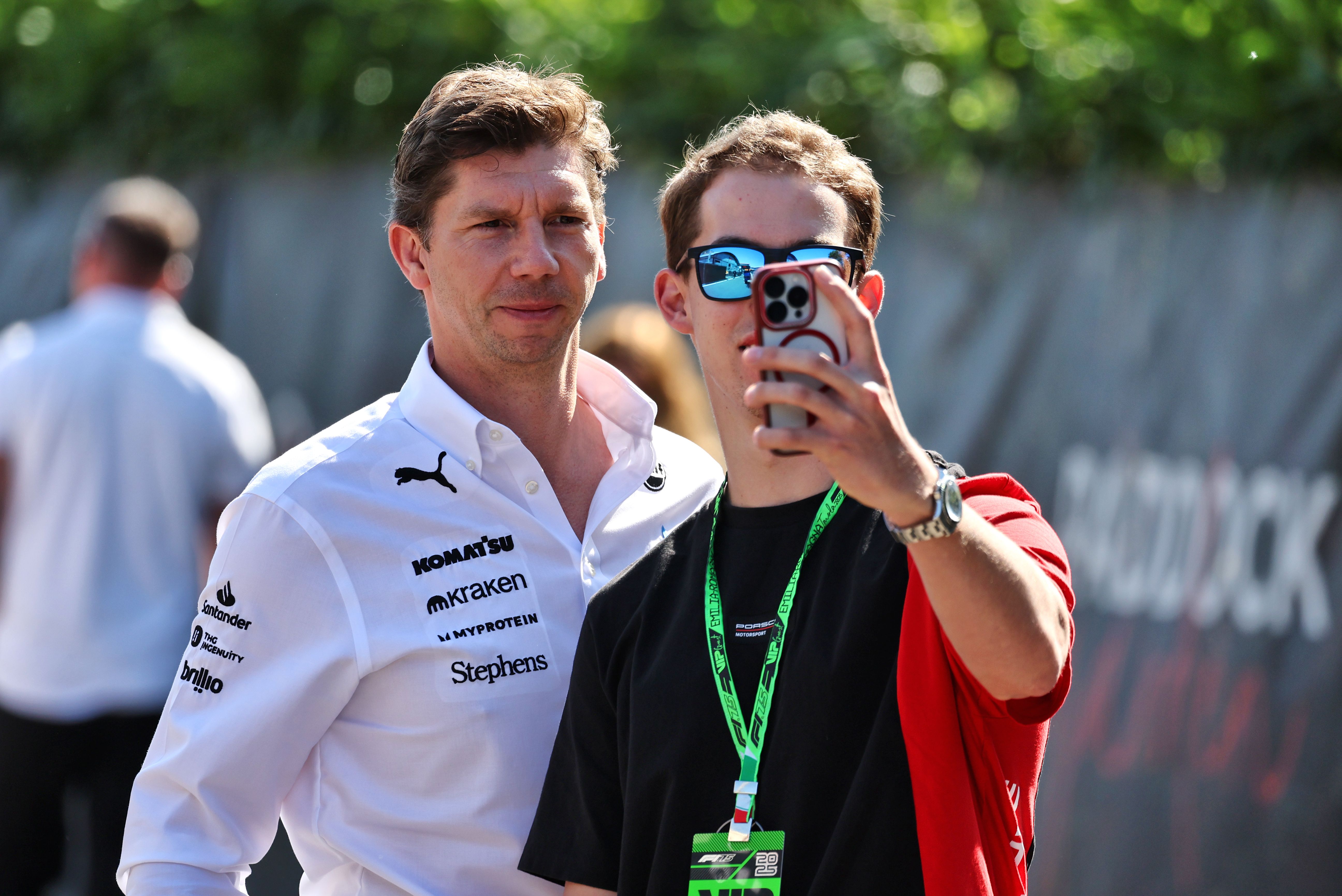 James arrives in the paddock and is greeted by a fan.
