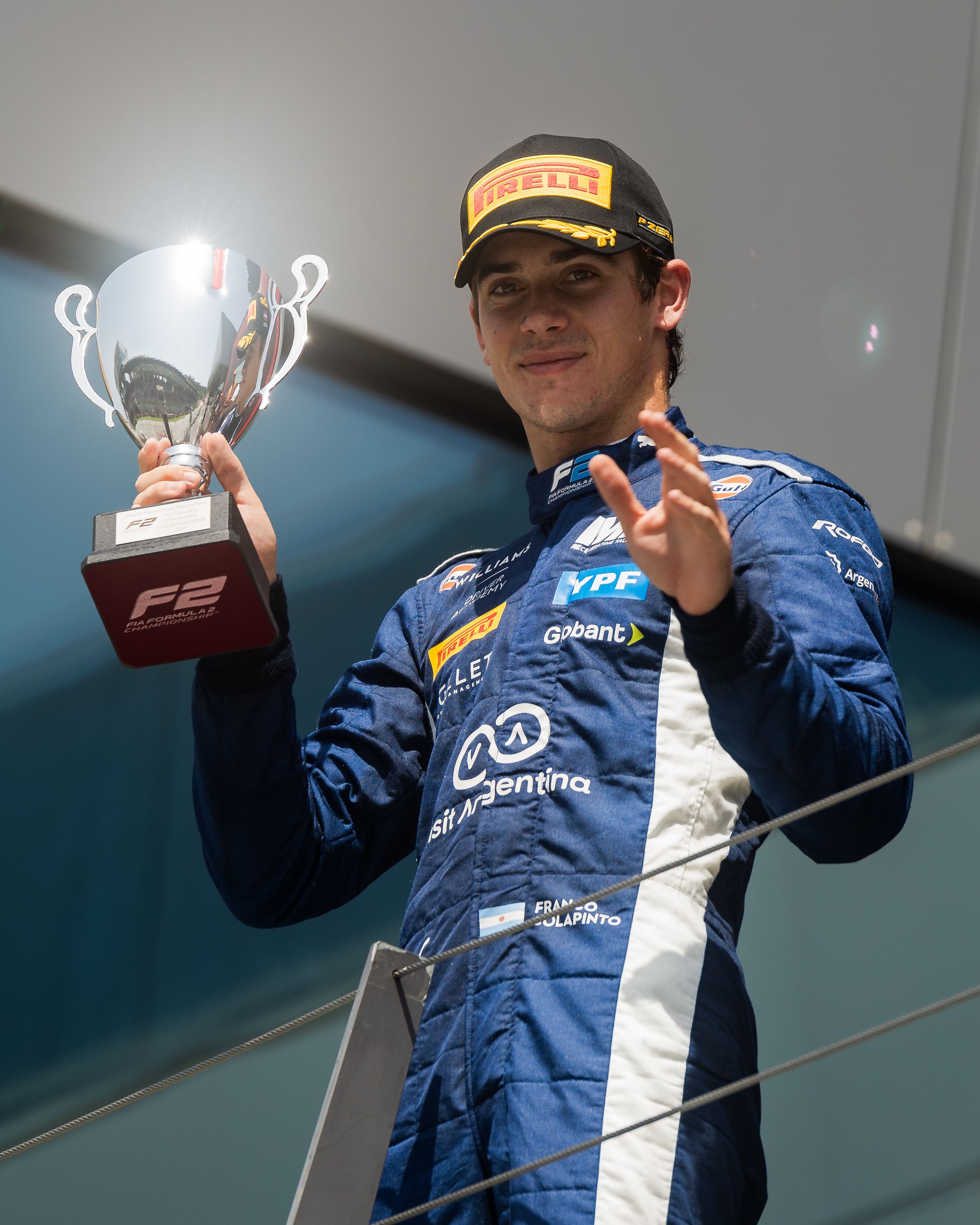 Shining on the podium.