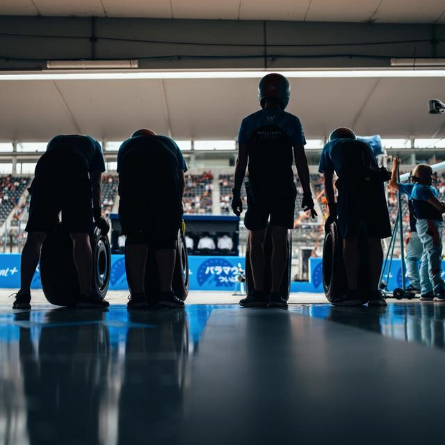Our pit crew wait in the shadows to swap tyres.