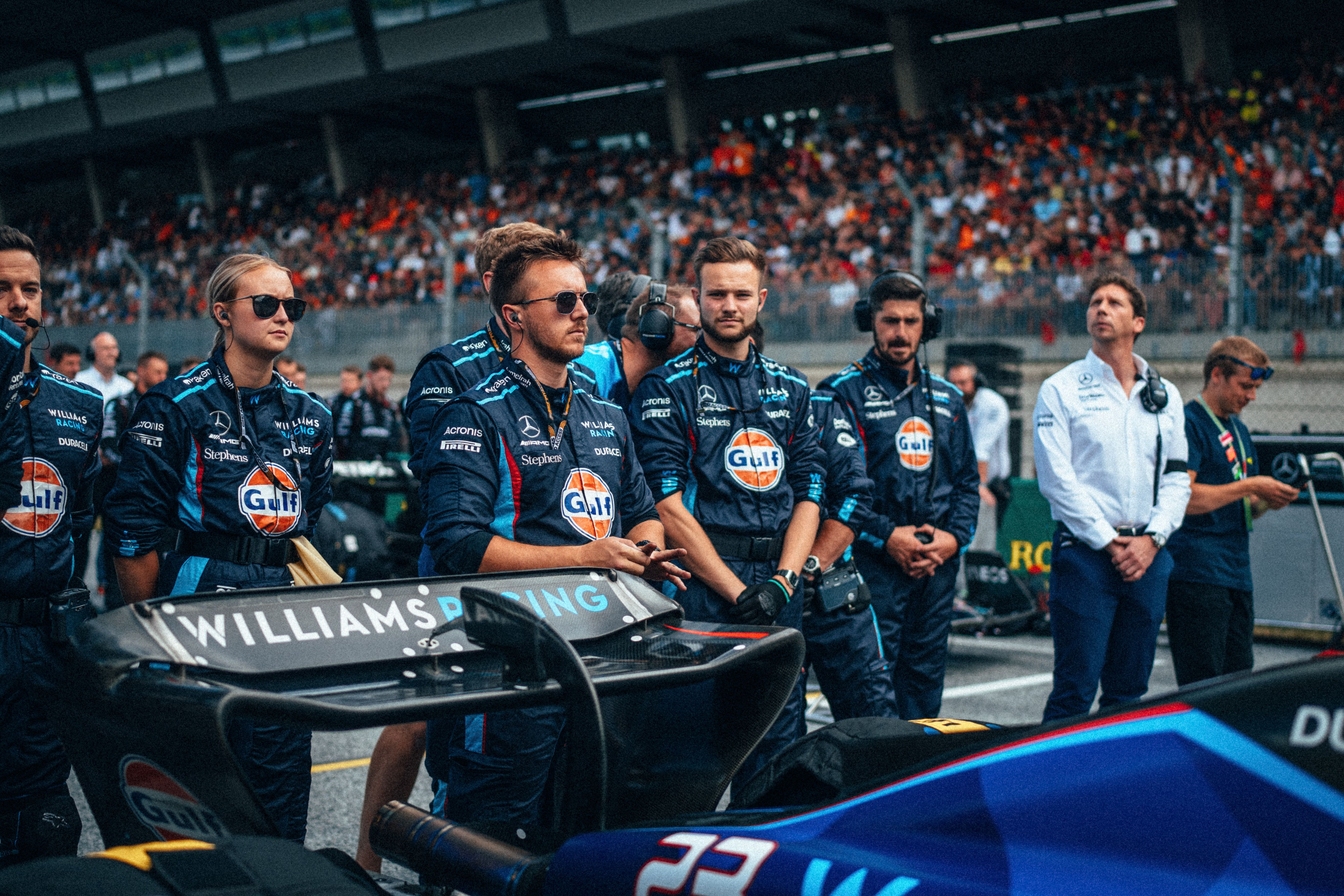 Albono’s crew wait patiently for the race to start.
