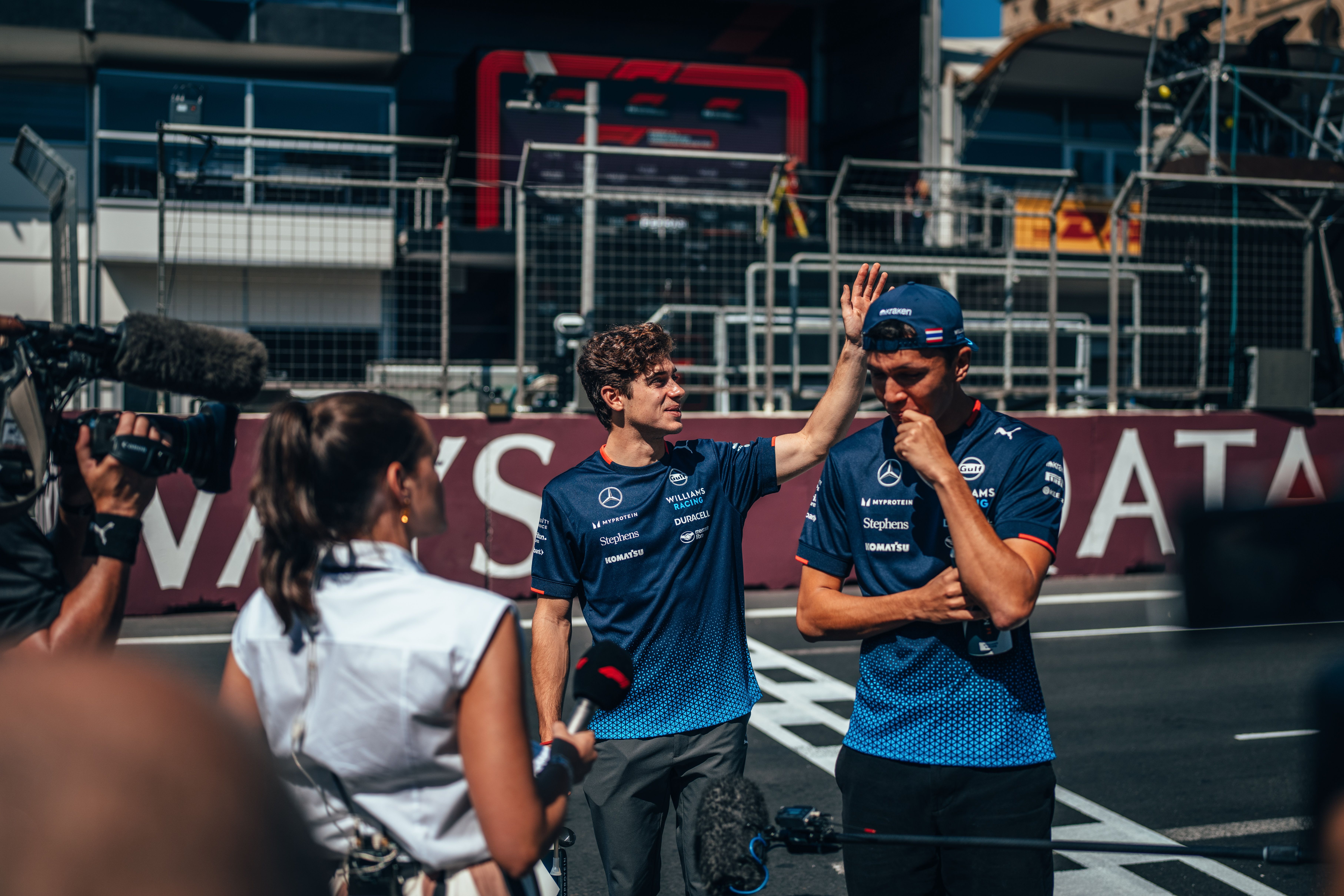 Franco waves to the fans as our duo tackle a pre-race interview