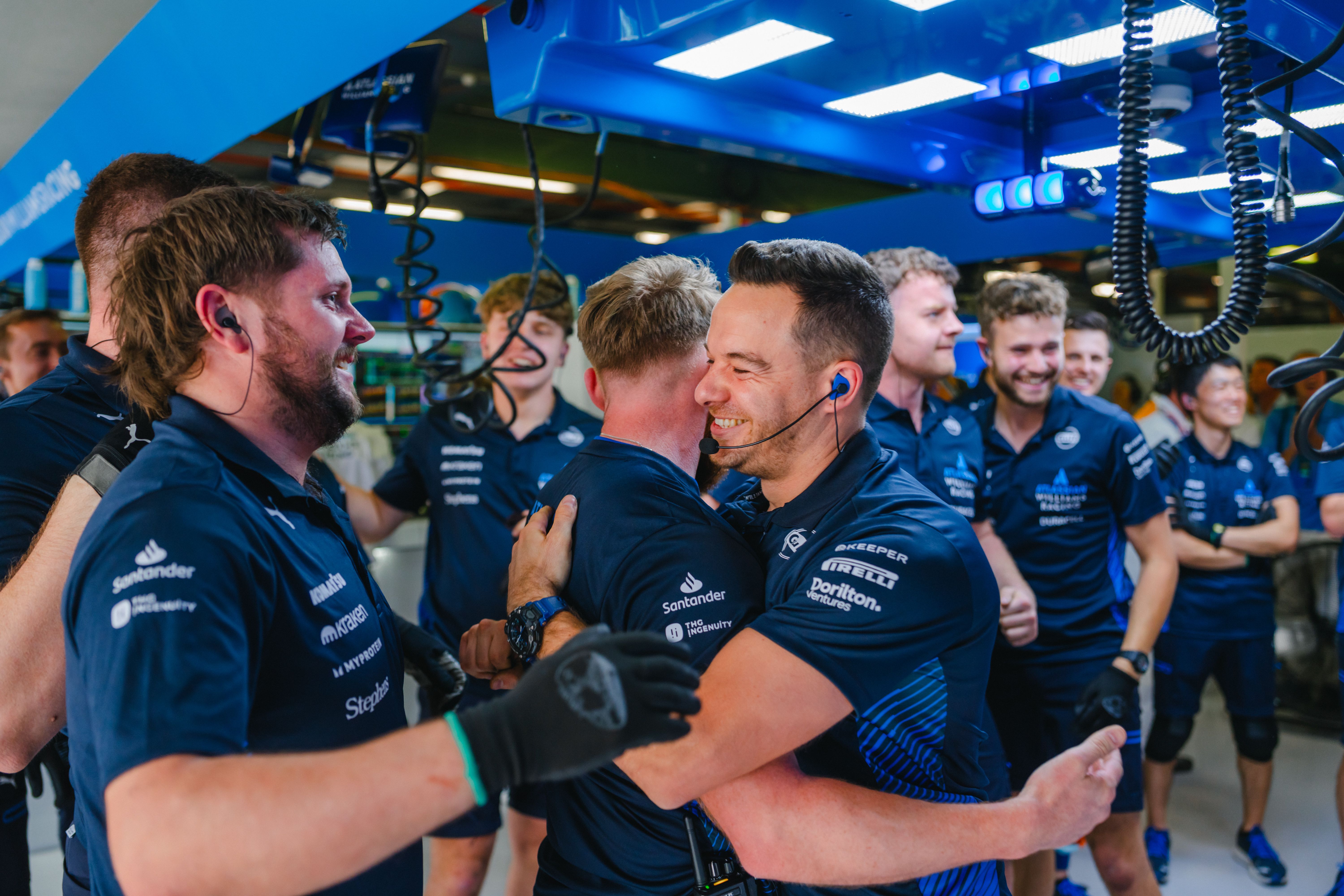 The pit crew celebrate our result