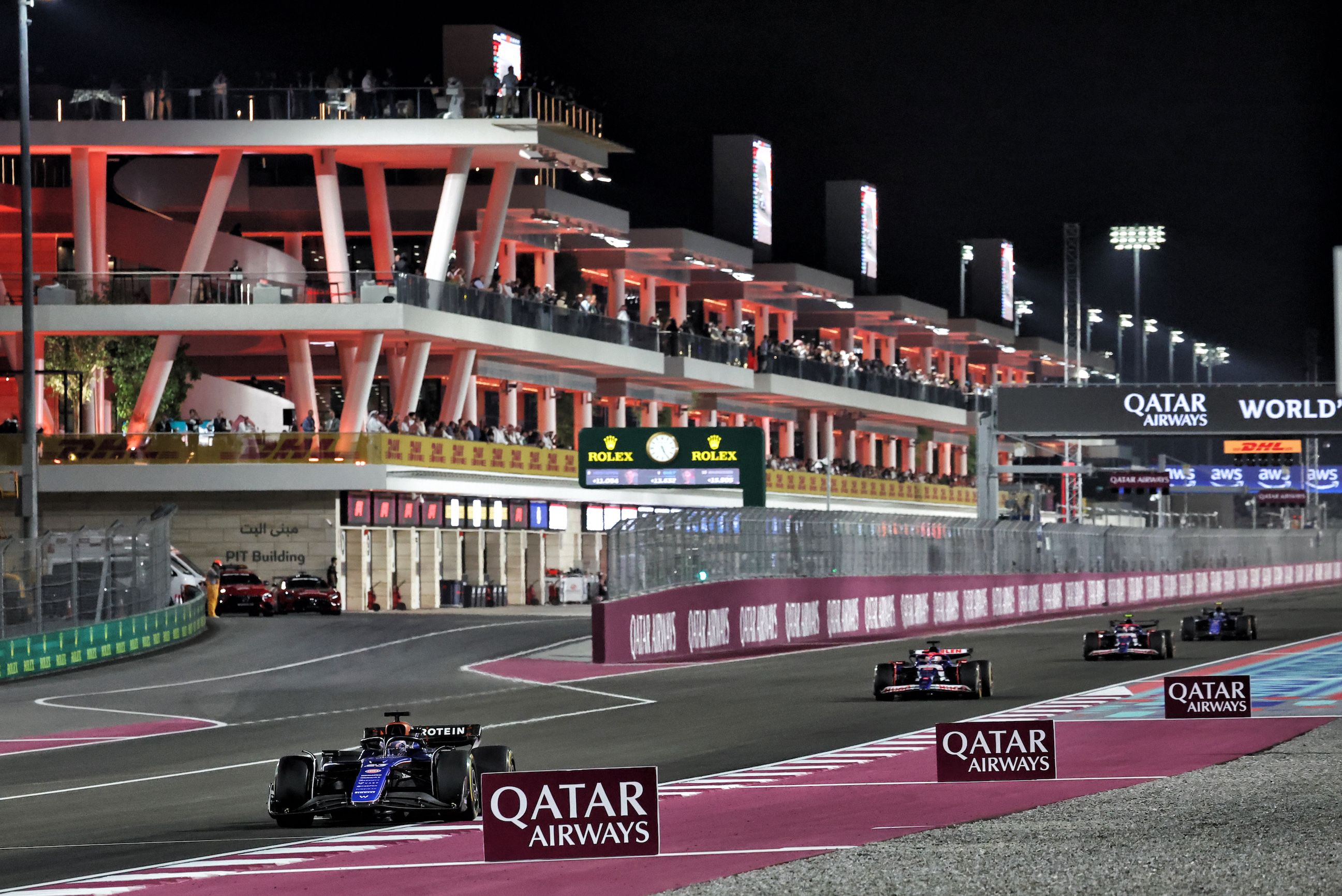 Alex heads down the pit straight as he chases down his rivals.