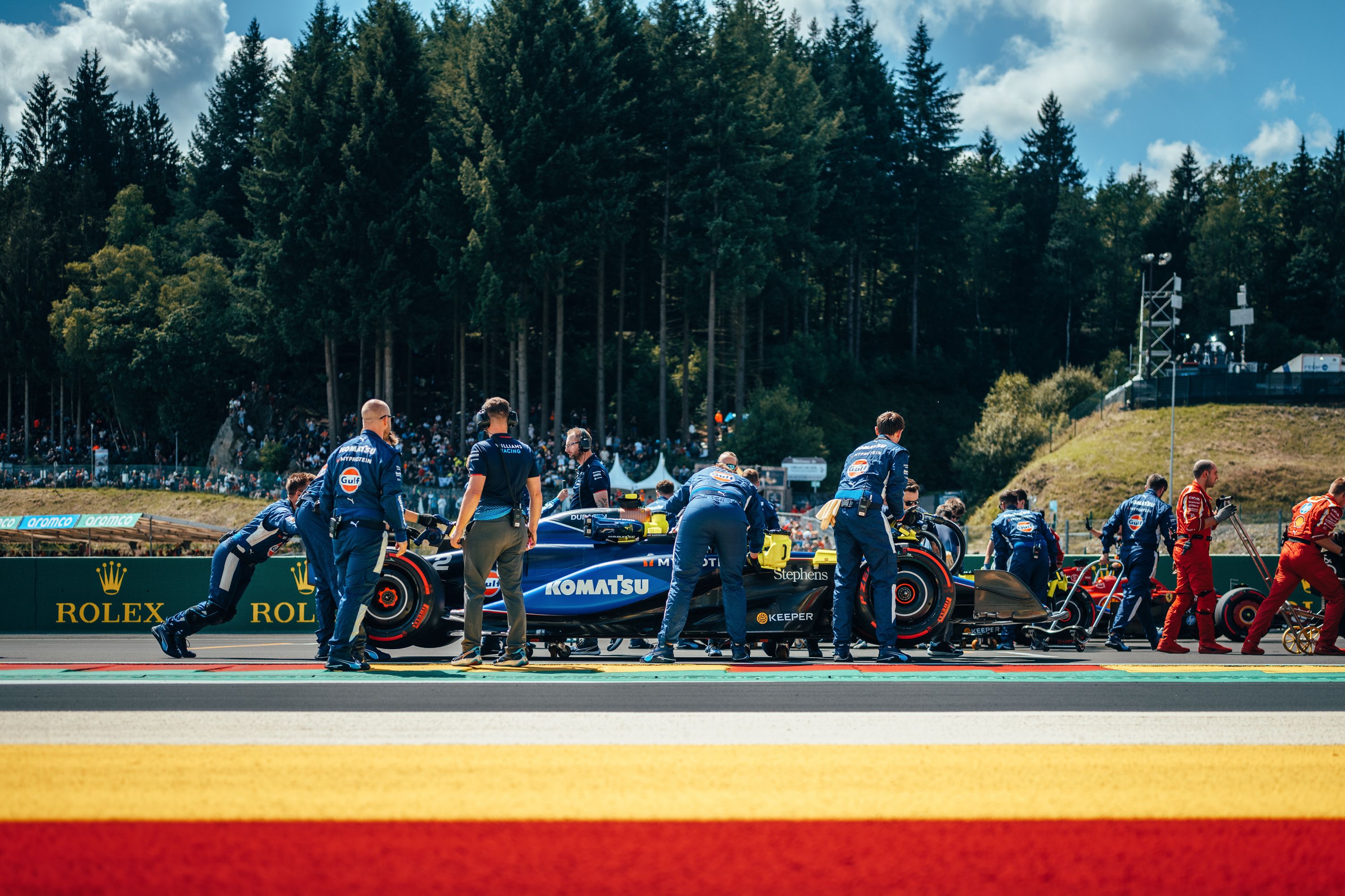 The team take our cars to the starting grid. 