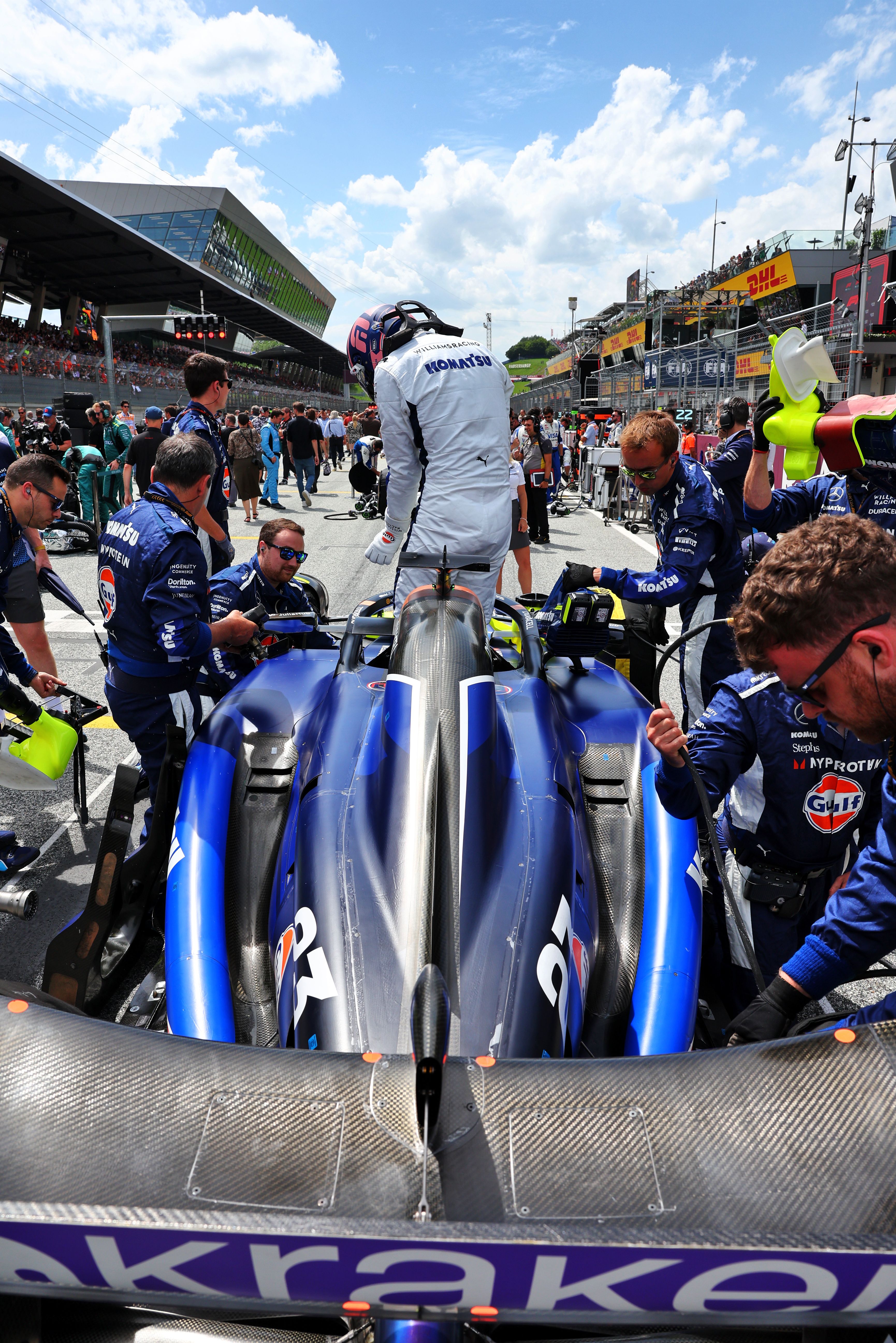 Alex jumping in the FW46 cockpit.