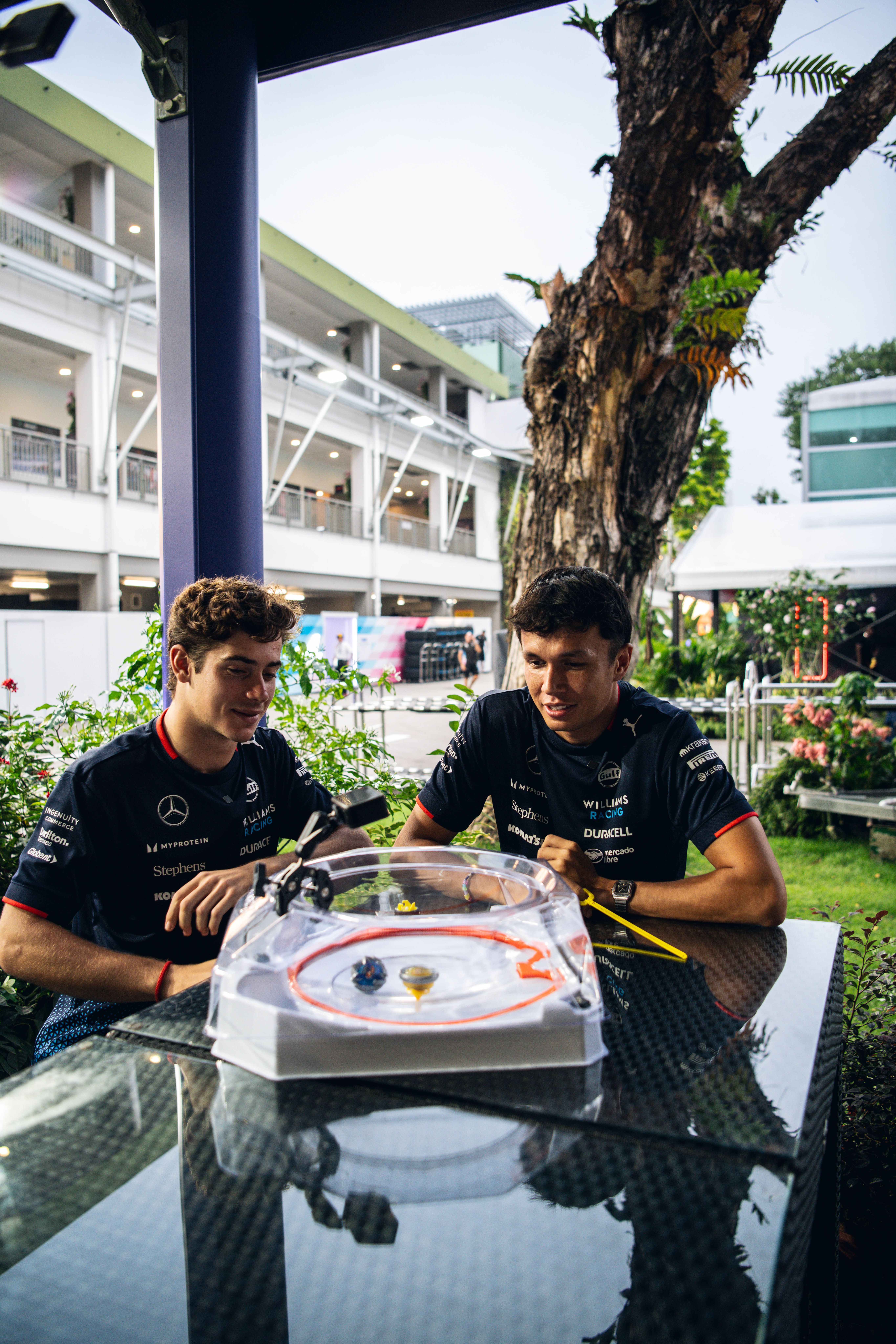 Absolute focus on the beyblades.