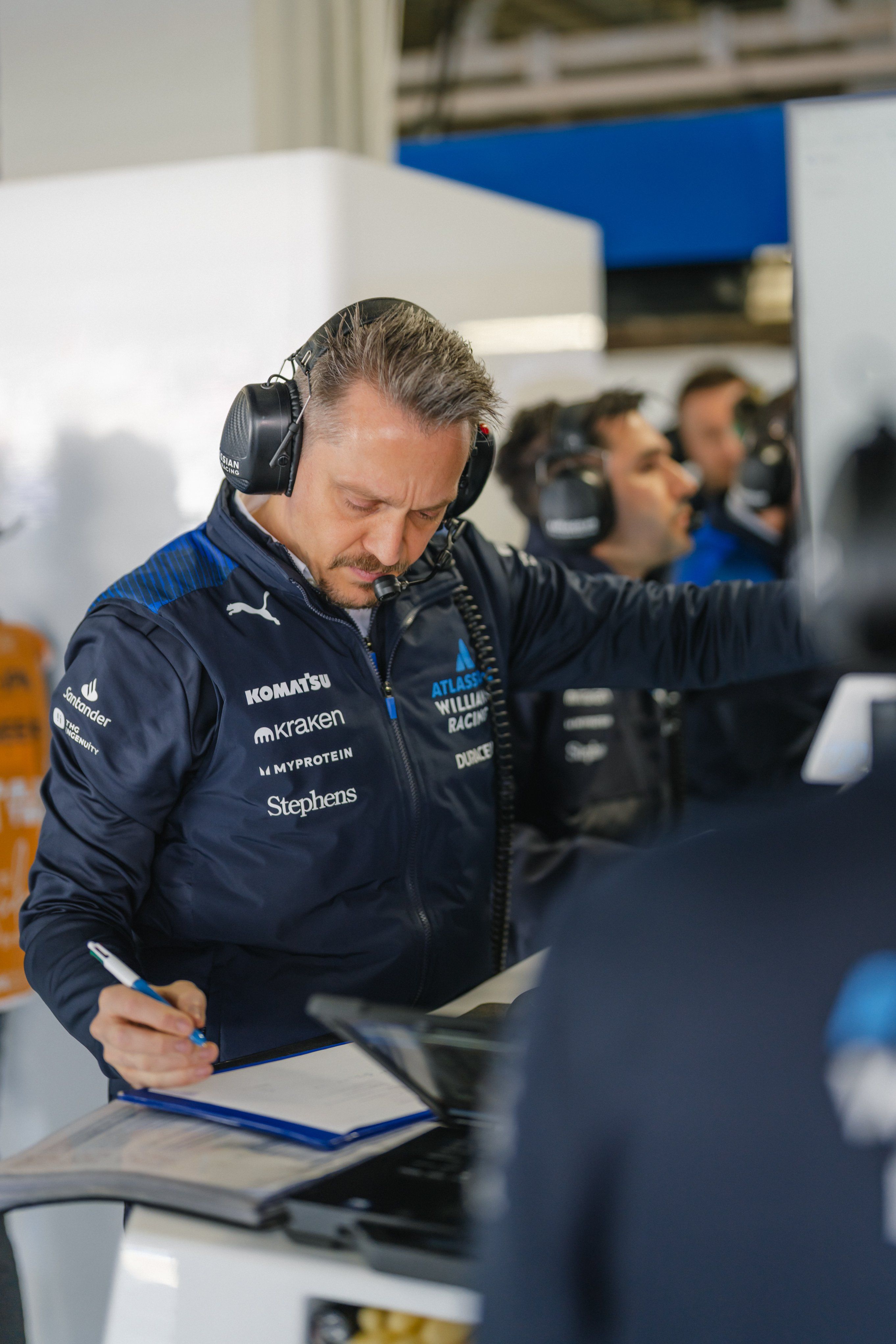 Gaetan Jego taking some notes from Carlos in FP1. 