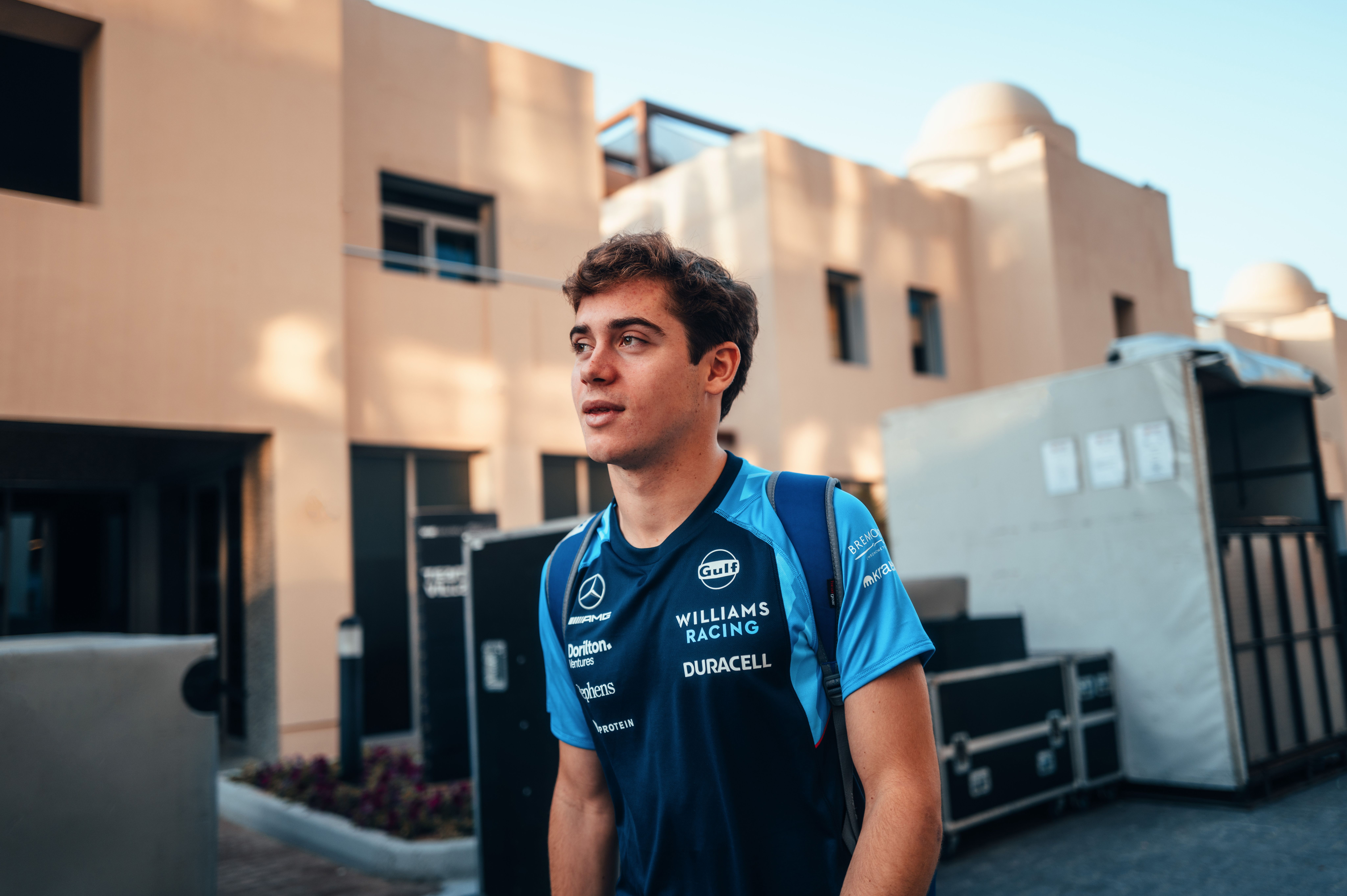 Checking in for his first day driving an F1 car.