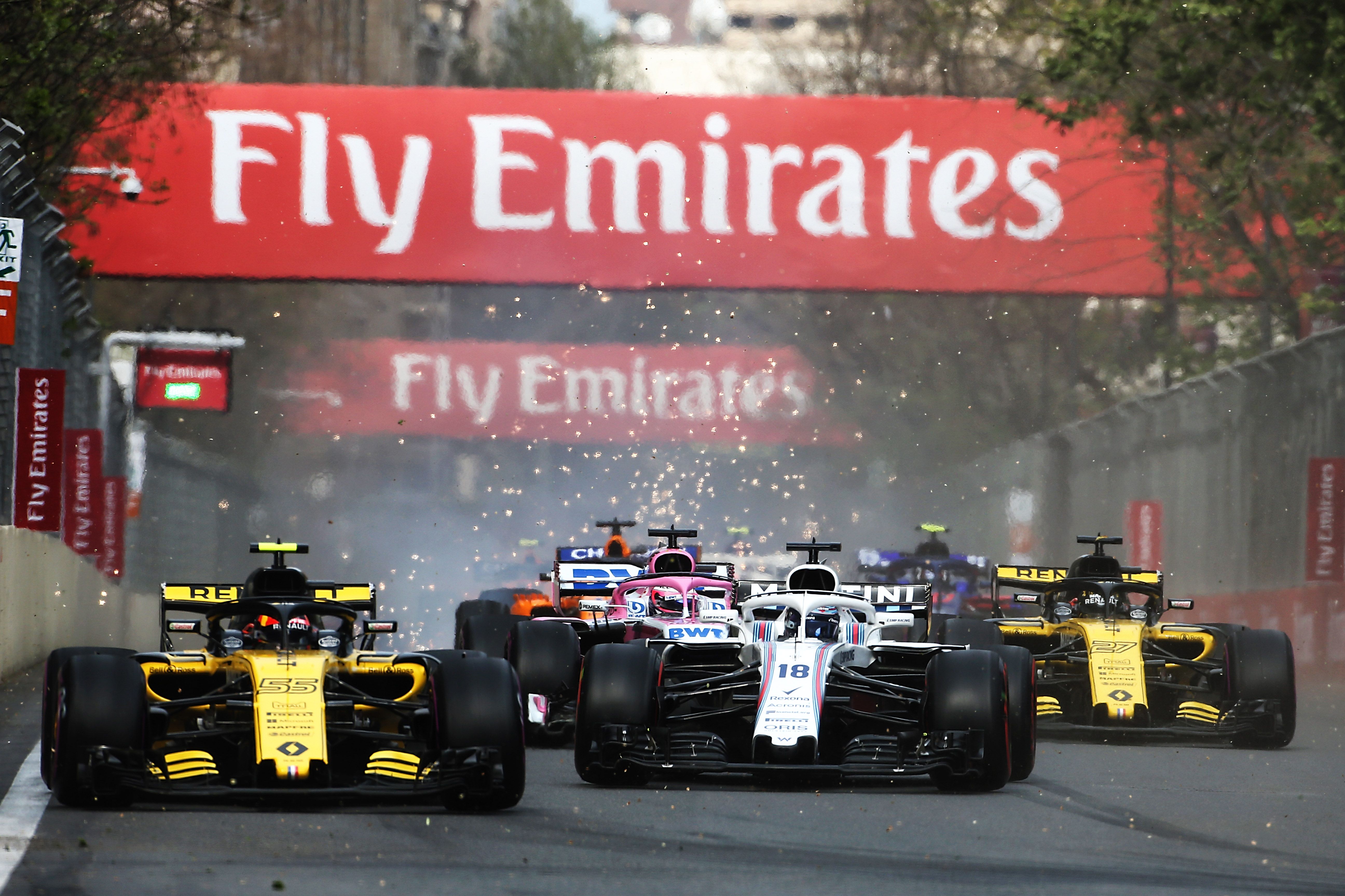 Side by side action is a guarantee in Baku, here Lance battles with Carlos Sainz at the start in 2018..