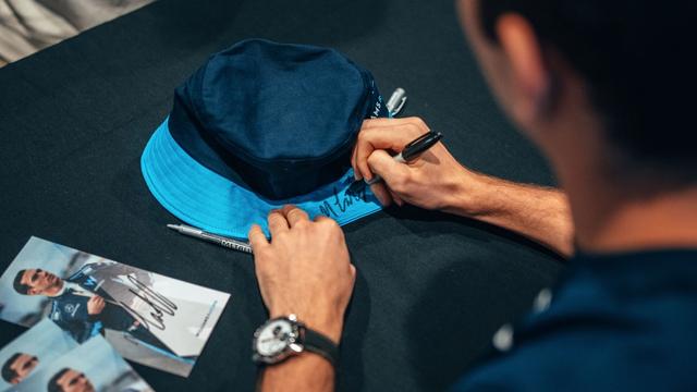 Who knew our bucket hat could get better? But then we saw a SIGNED bucket hat