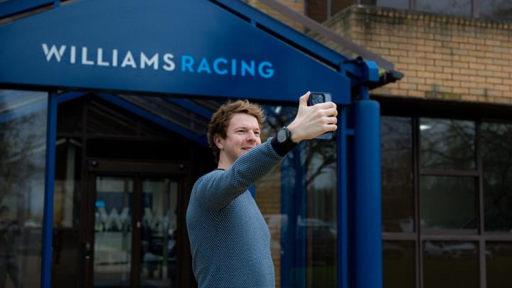 Oliver Turvey poses for a selfie at the Williams Racing Grove Headquarters