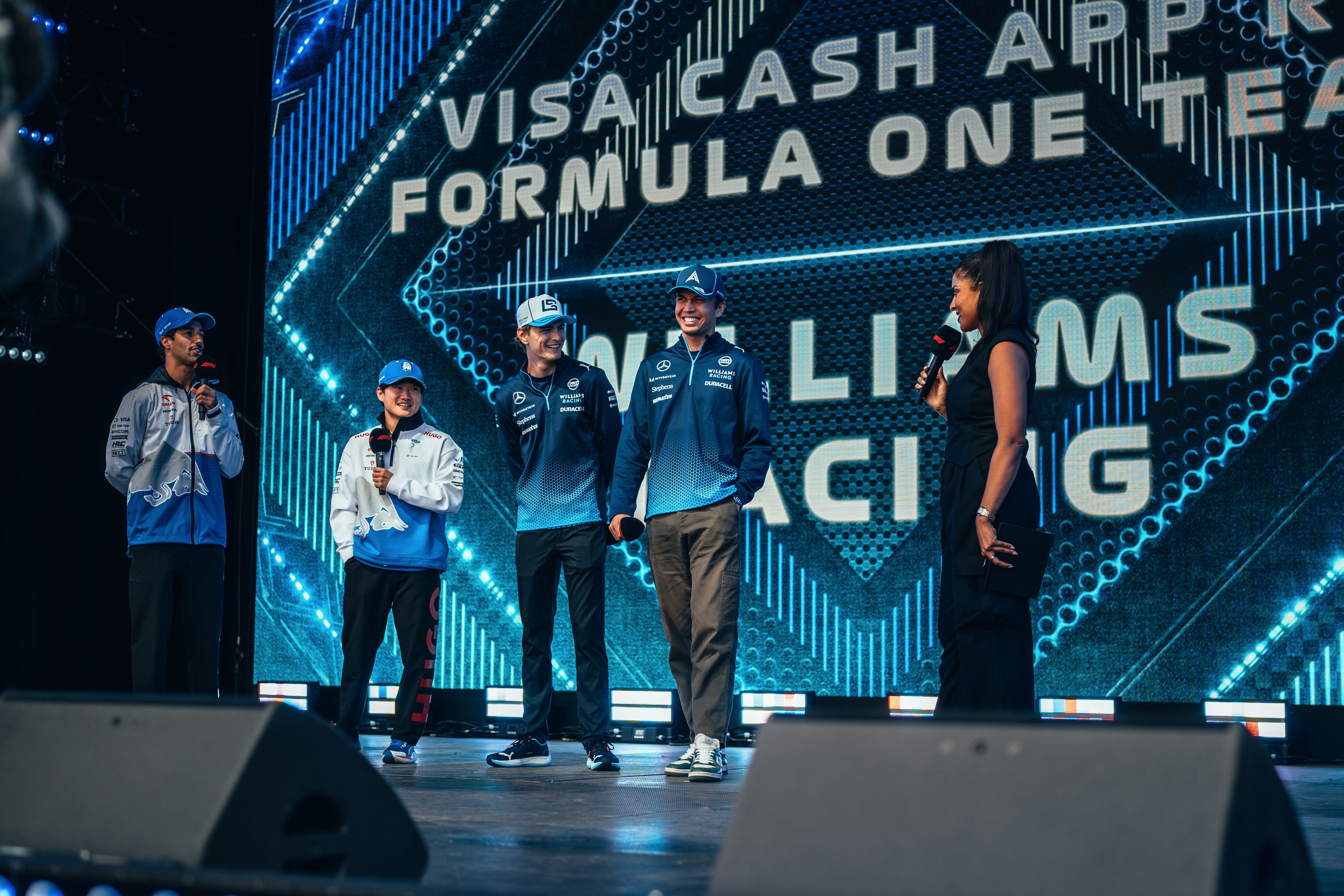 Four friends at the Fans Forum.