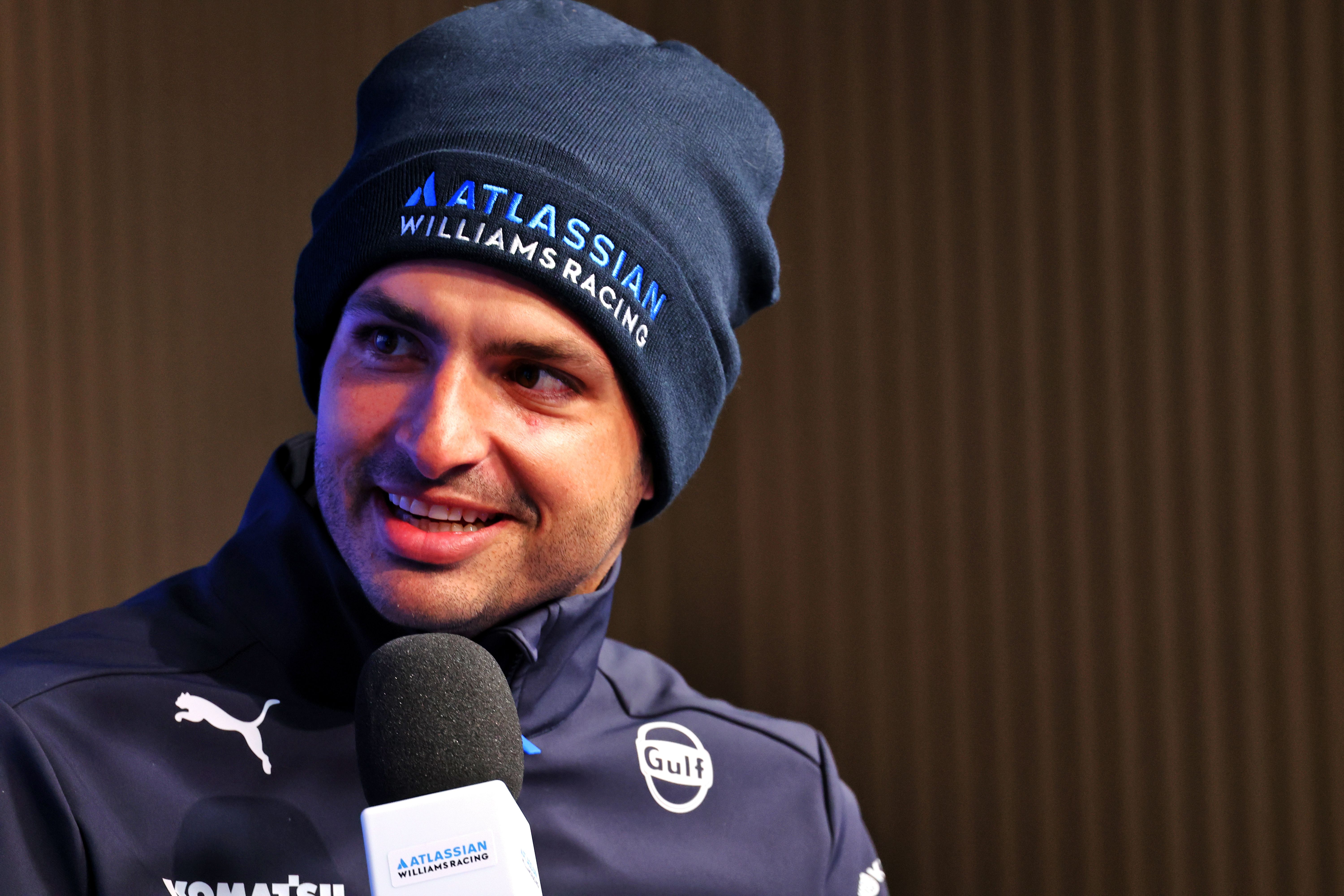 Carlos is all smiles on a chilly Silverstone morning.