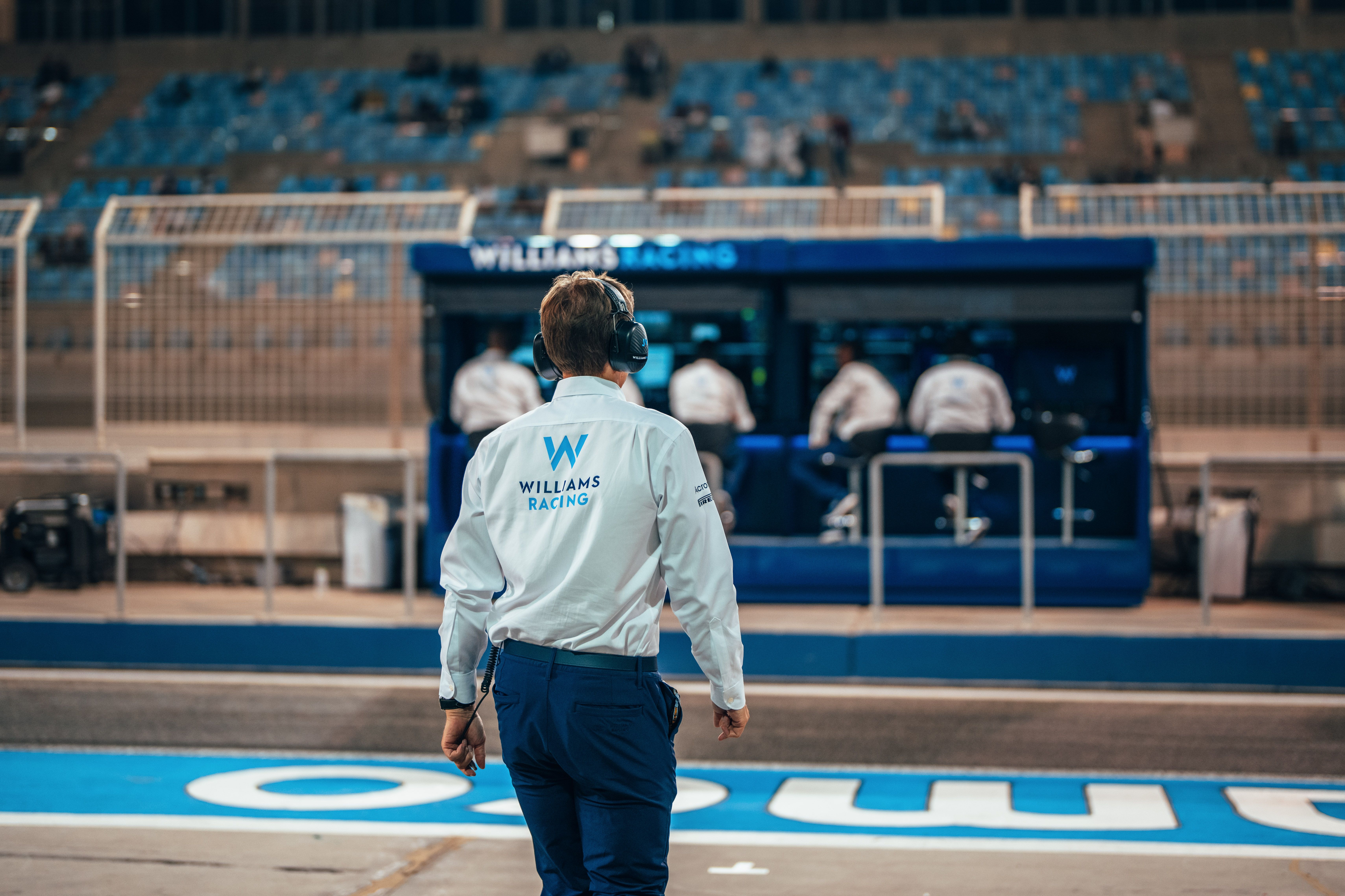 The boss heads for his seat prior to FP2.