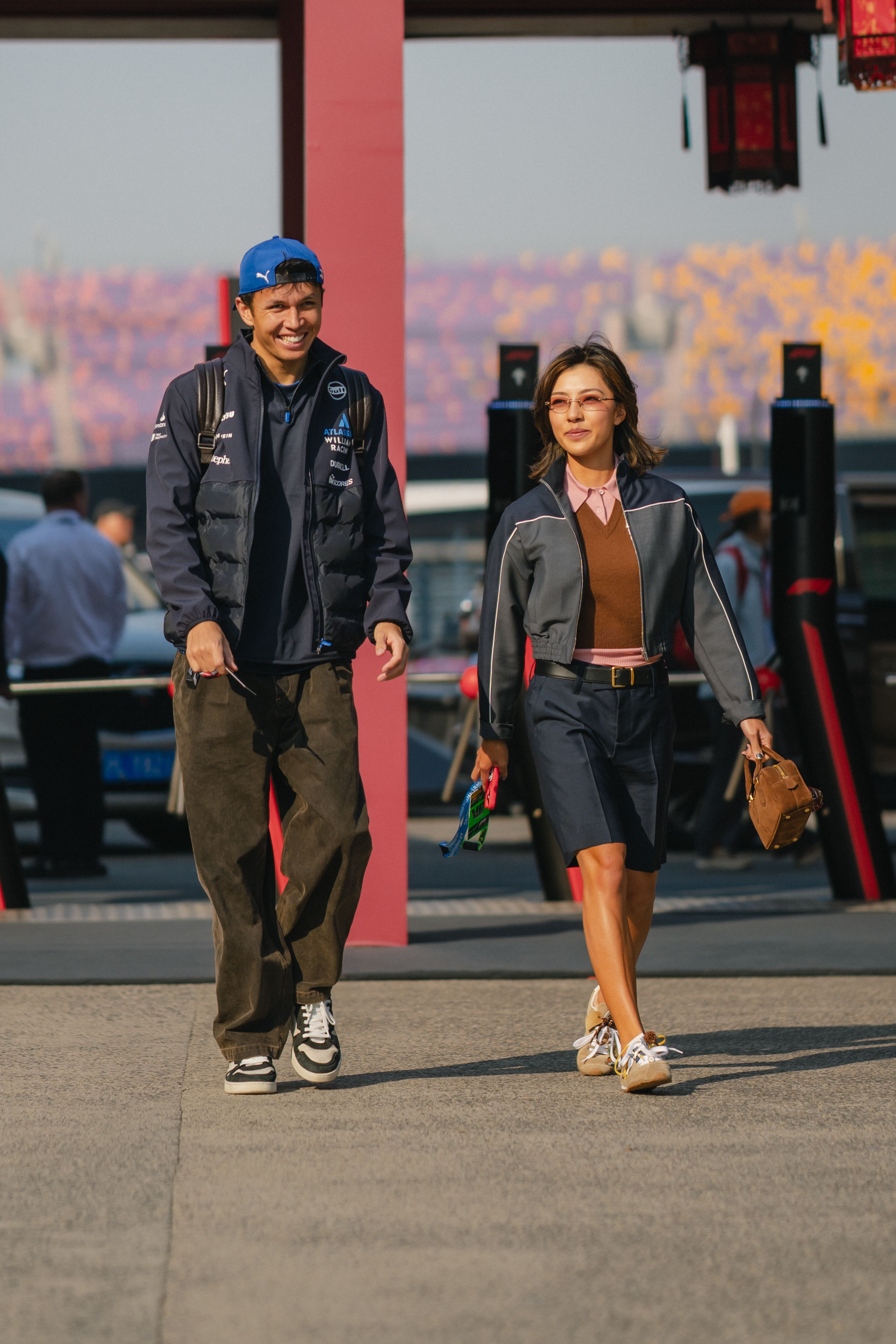 Alex and Lily arrive together in the Saturday paddock