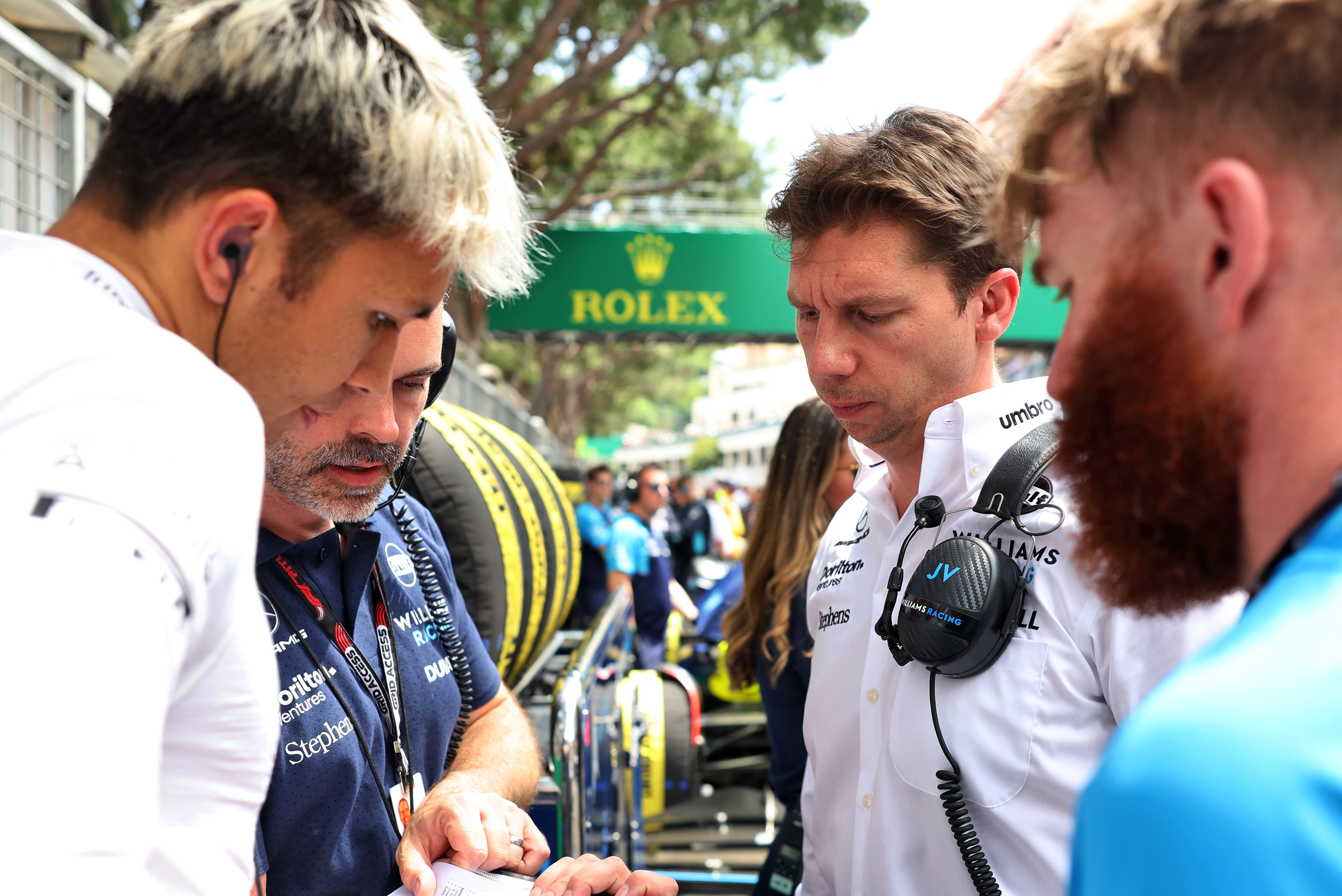 James and Alex check the gameplan with the team.