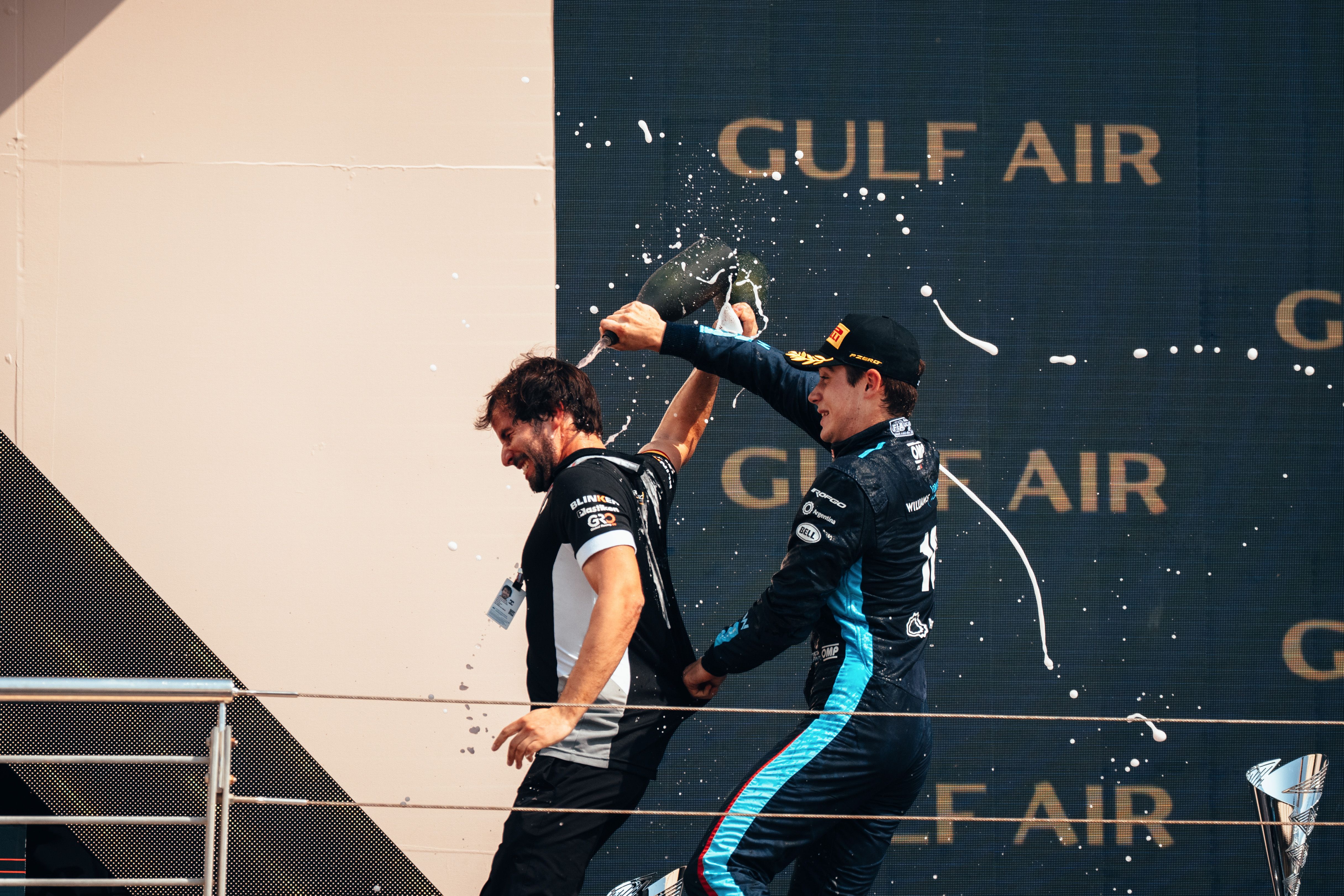 A special shower for the winners, courtesy of Colapinto