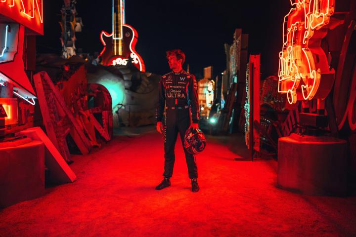 Alex basked in the glow of the Neon Museum last year