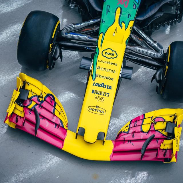 The pink flows over the yellow front wing as if pushed by the air