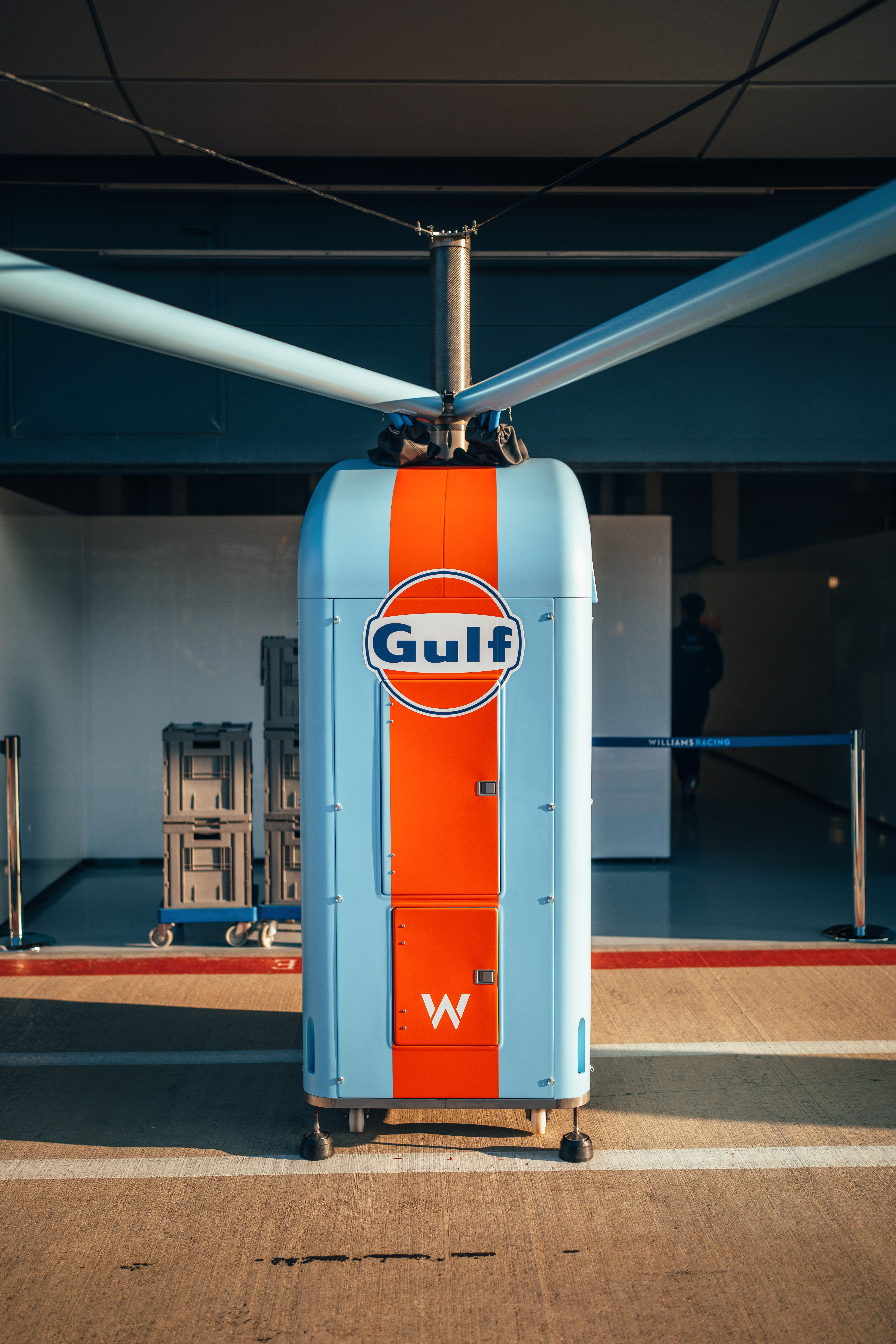 While the glorious Gulf-themed gantry glistens in the Silverstone sun.
