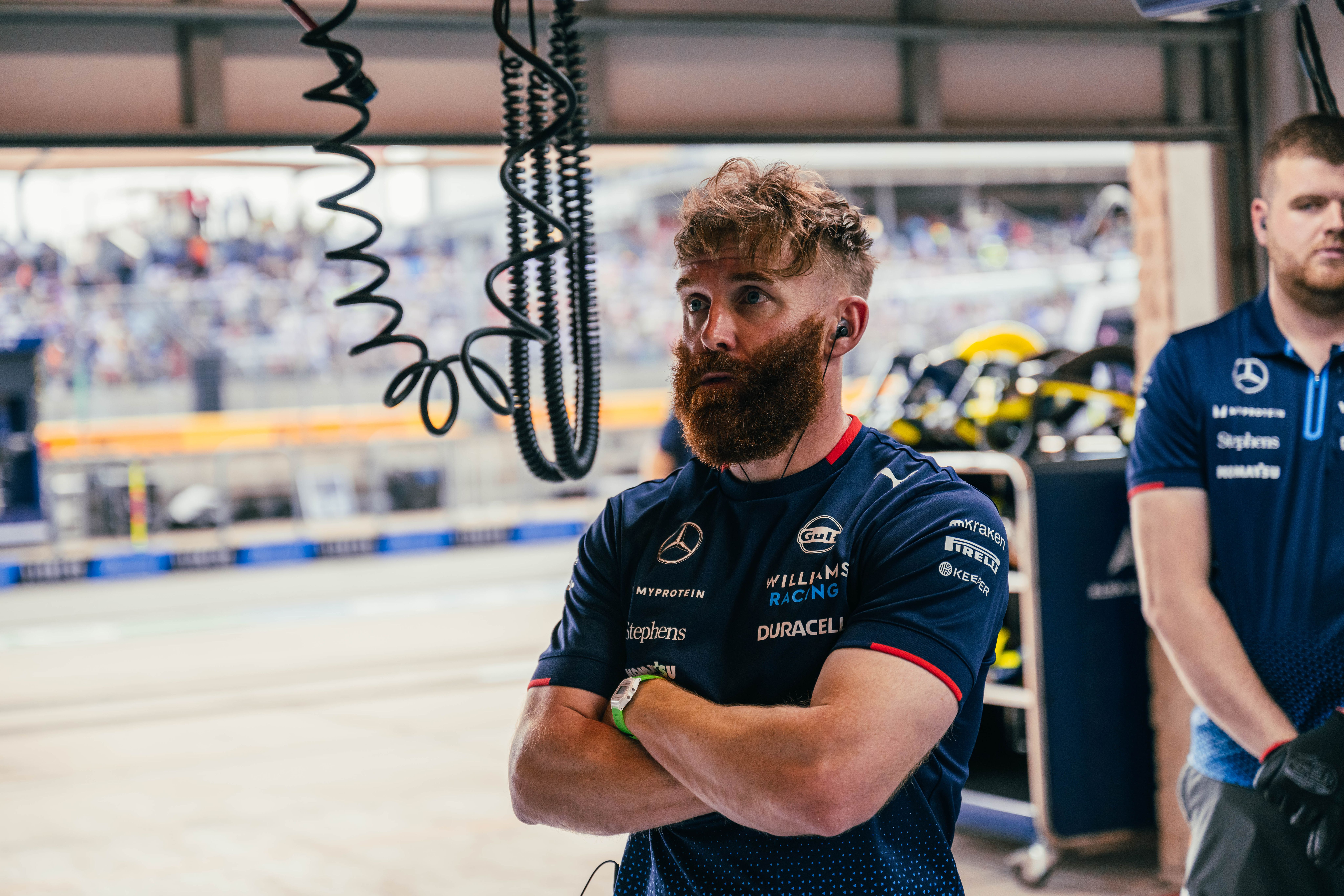 Patrick watches on from the pits