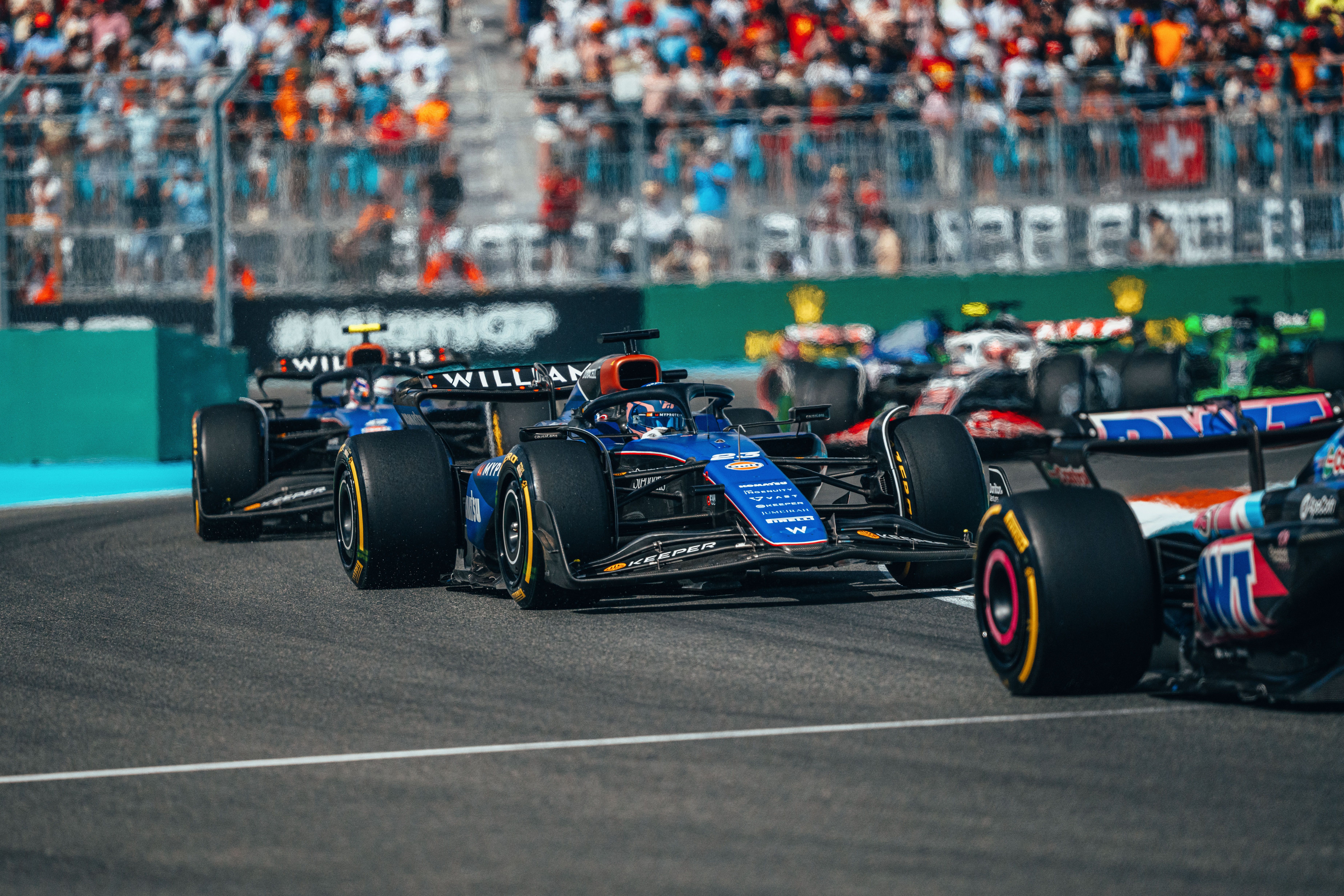 Racing in formation.