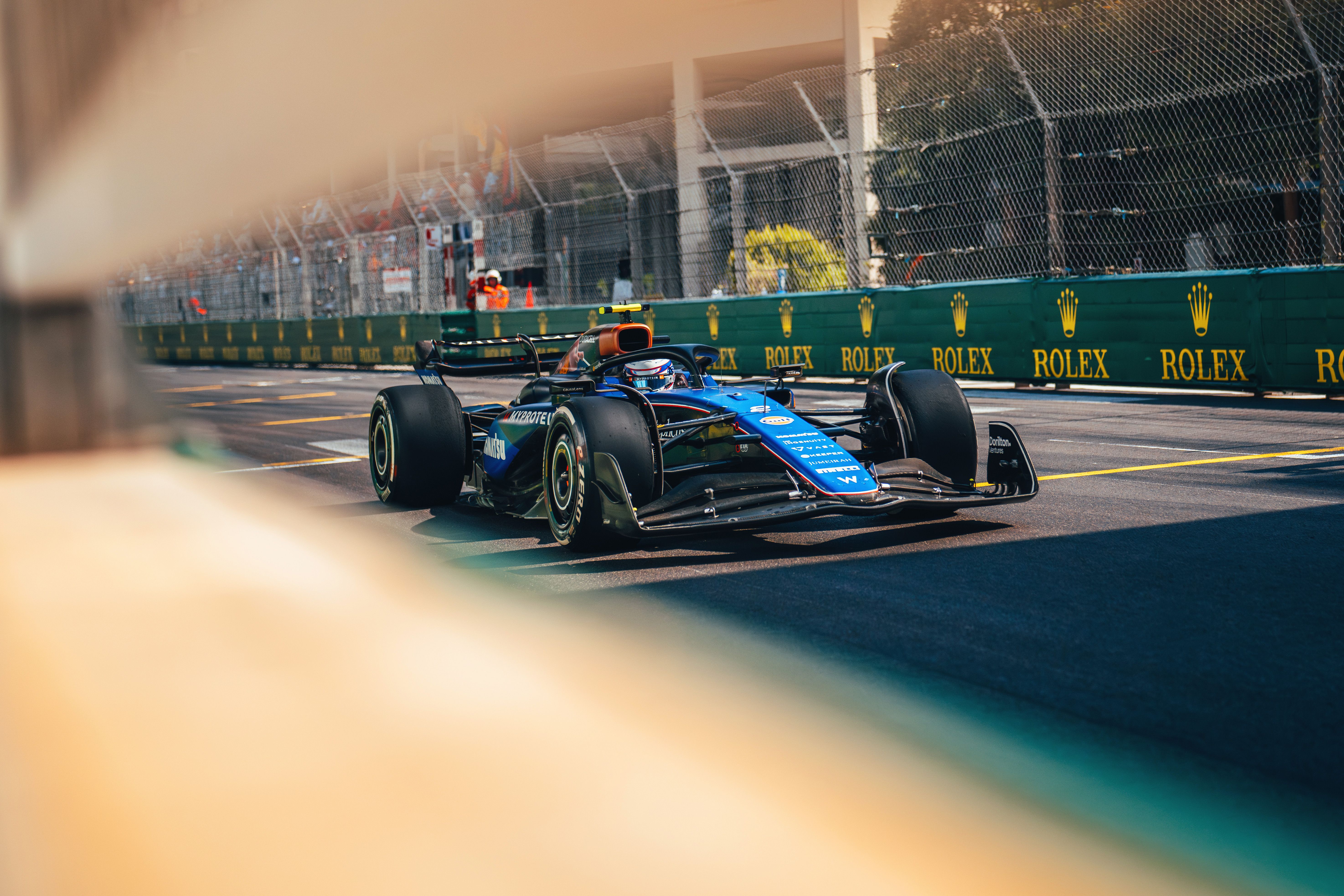 Logan looks to his pit board mid-race