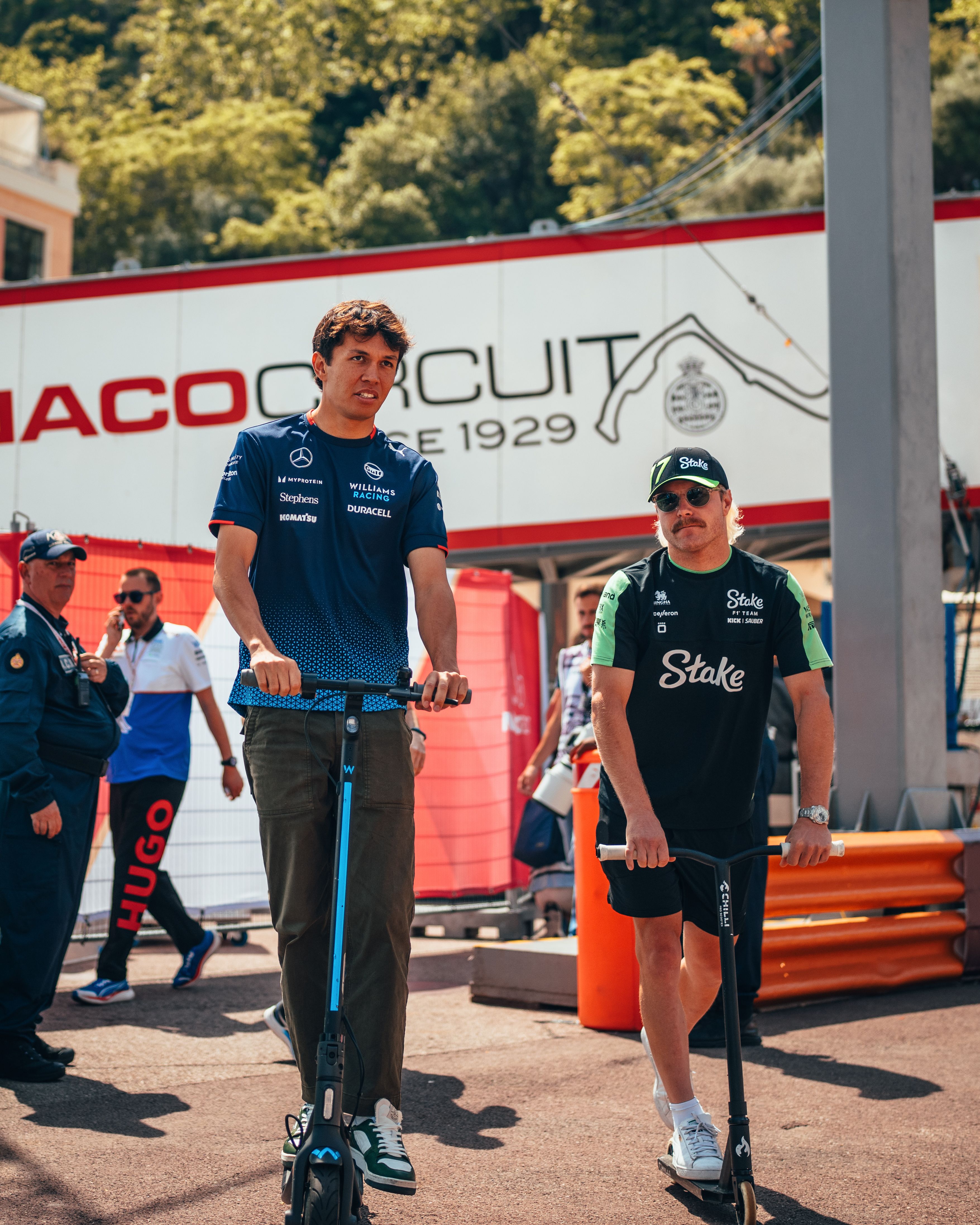 Alex has company on his two-wheeled entry to the paddock