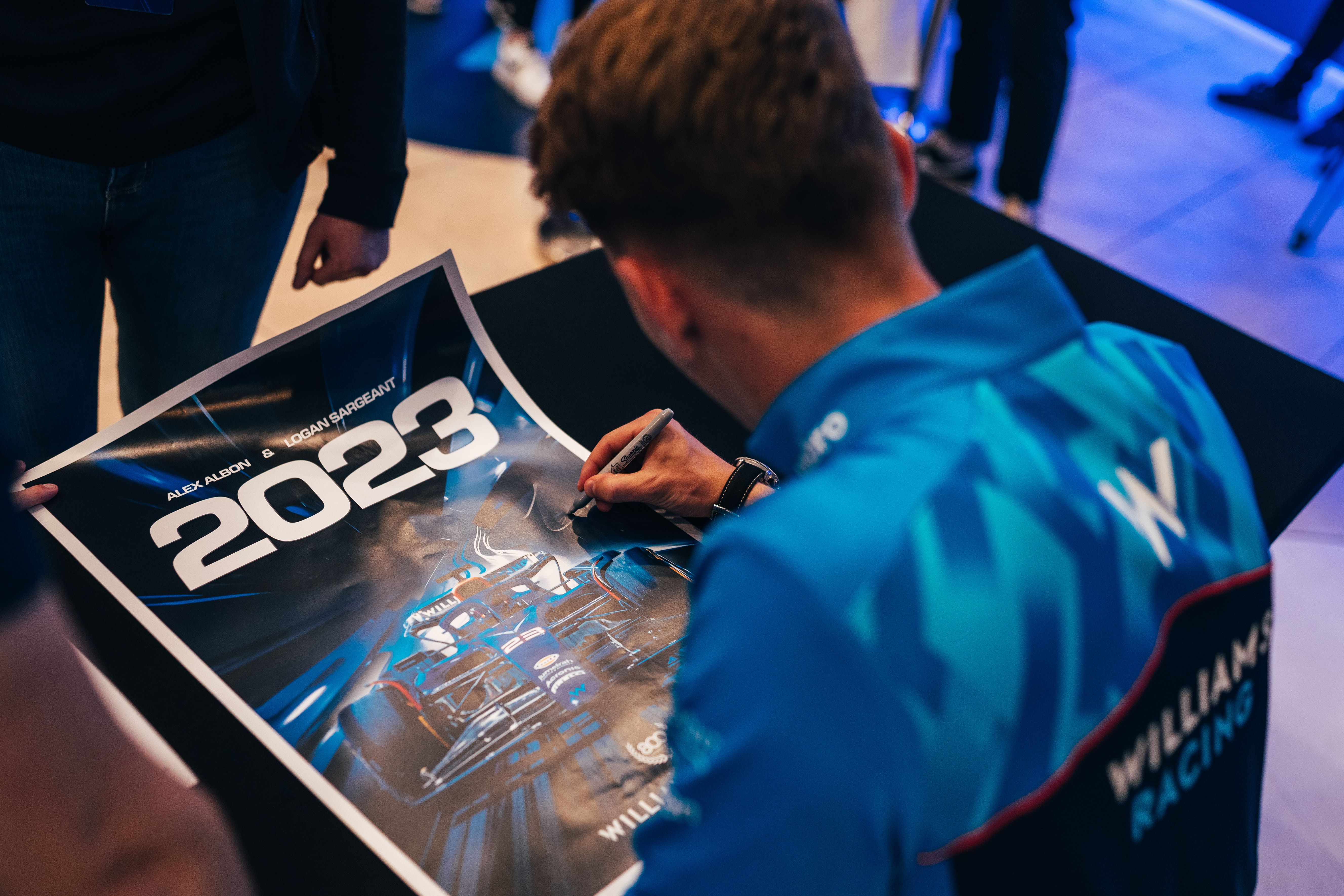 Signing one of our new posters, download one for yourself on our homepage.