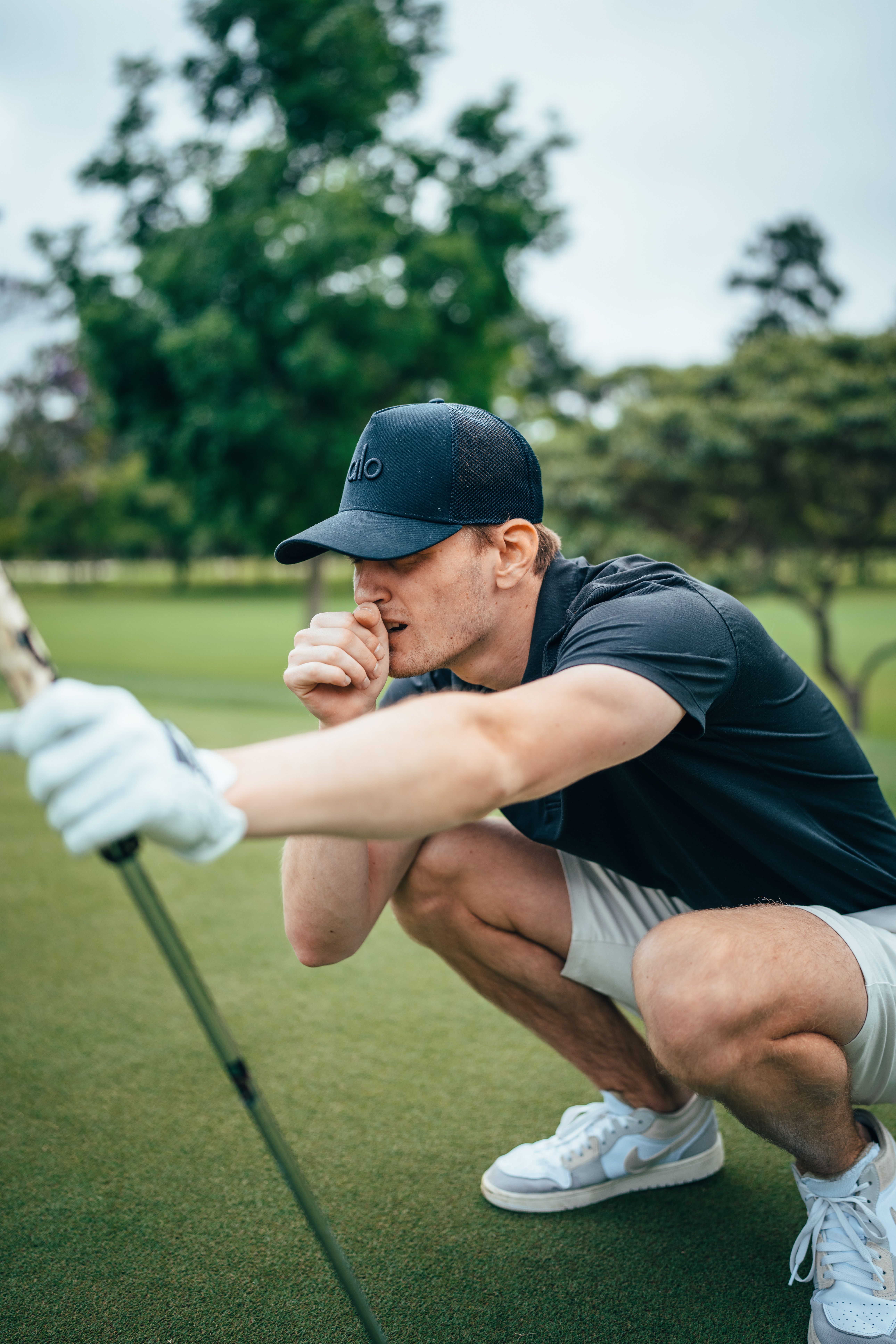 Sarge lines up his putt.