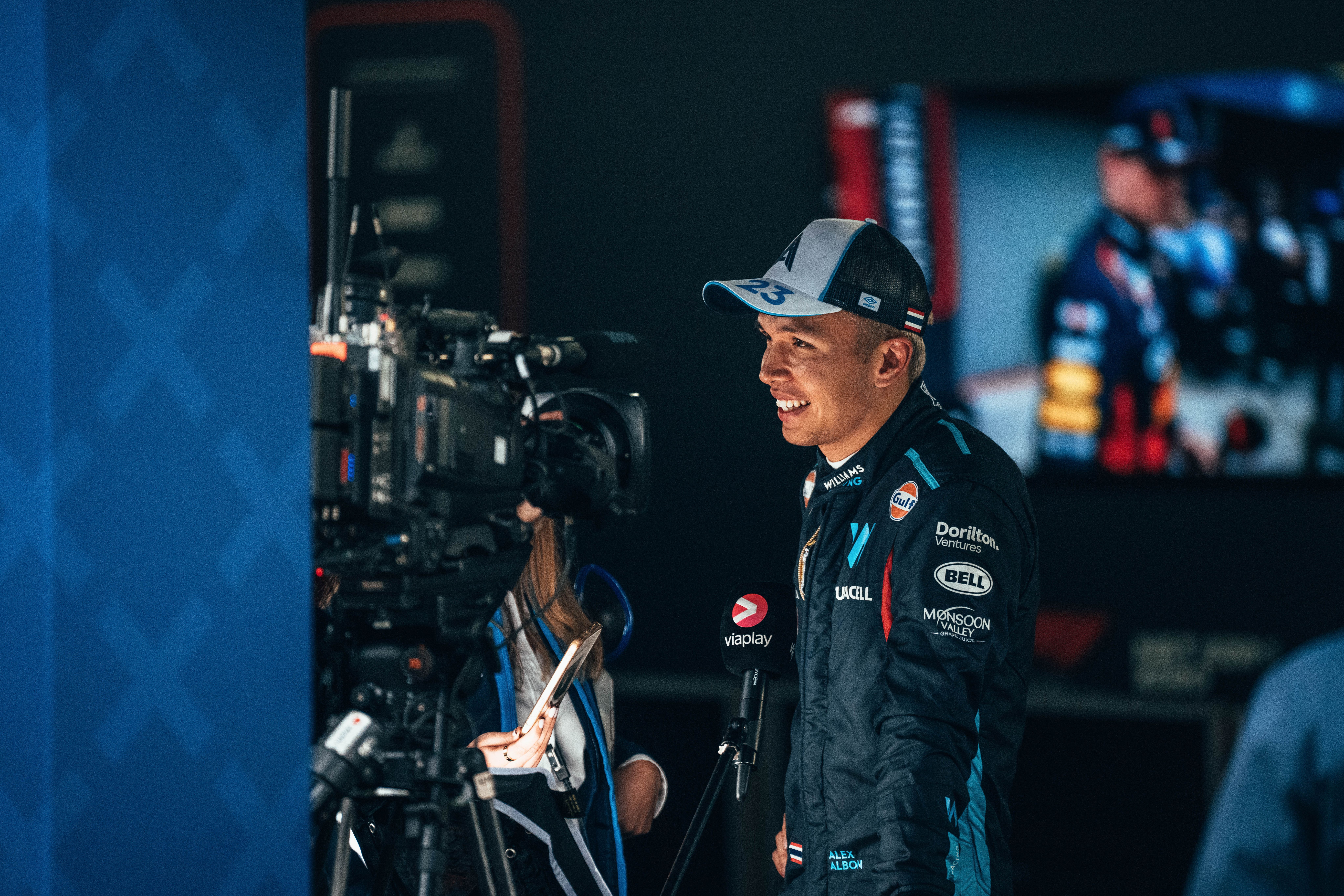 Plenty of smiles in the press pen.