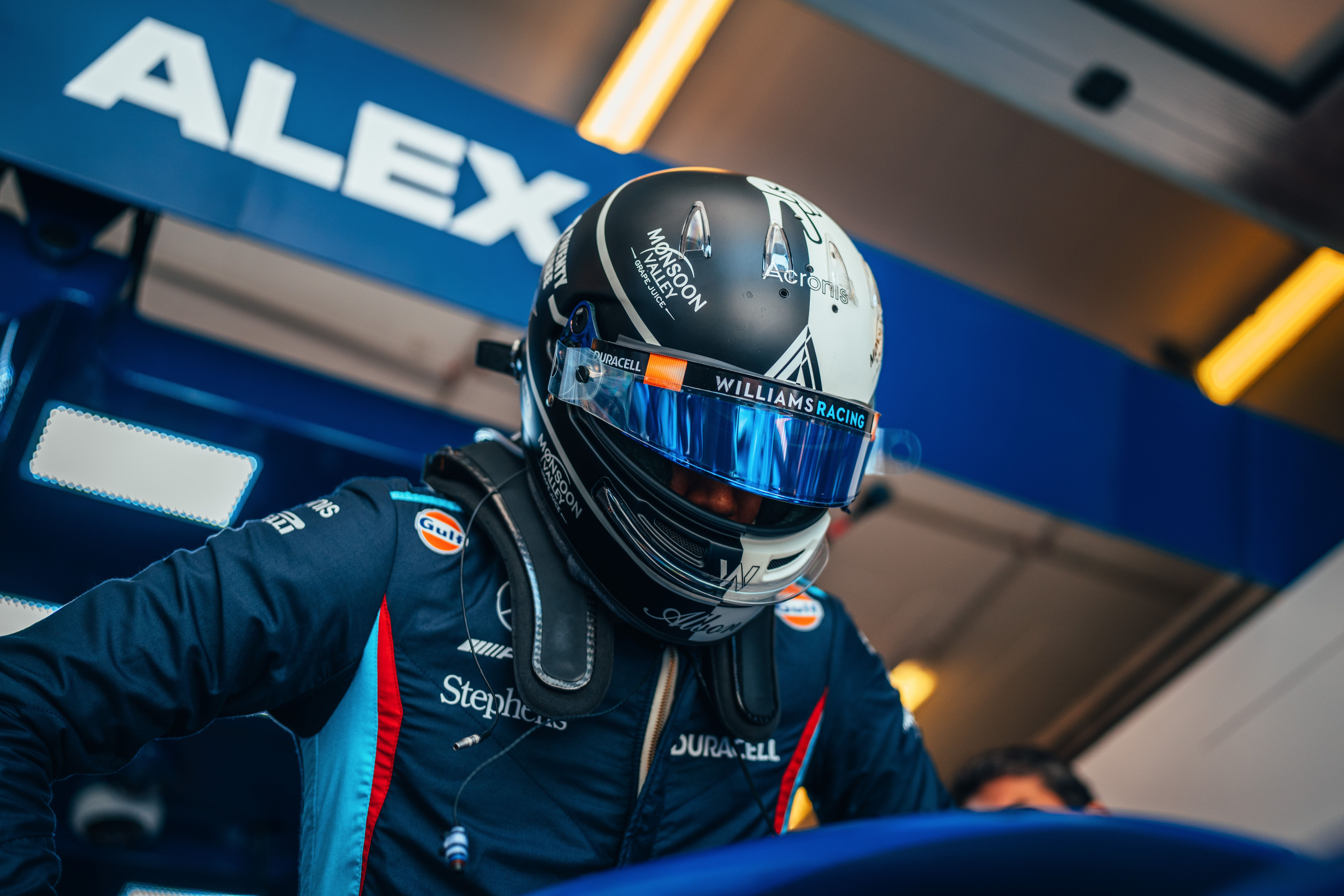 Albono gets in the cockpit for a hard day of racing in Hungary.