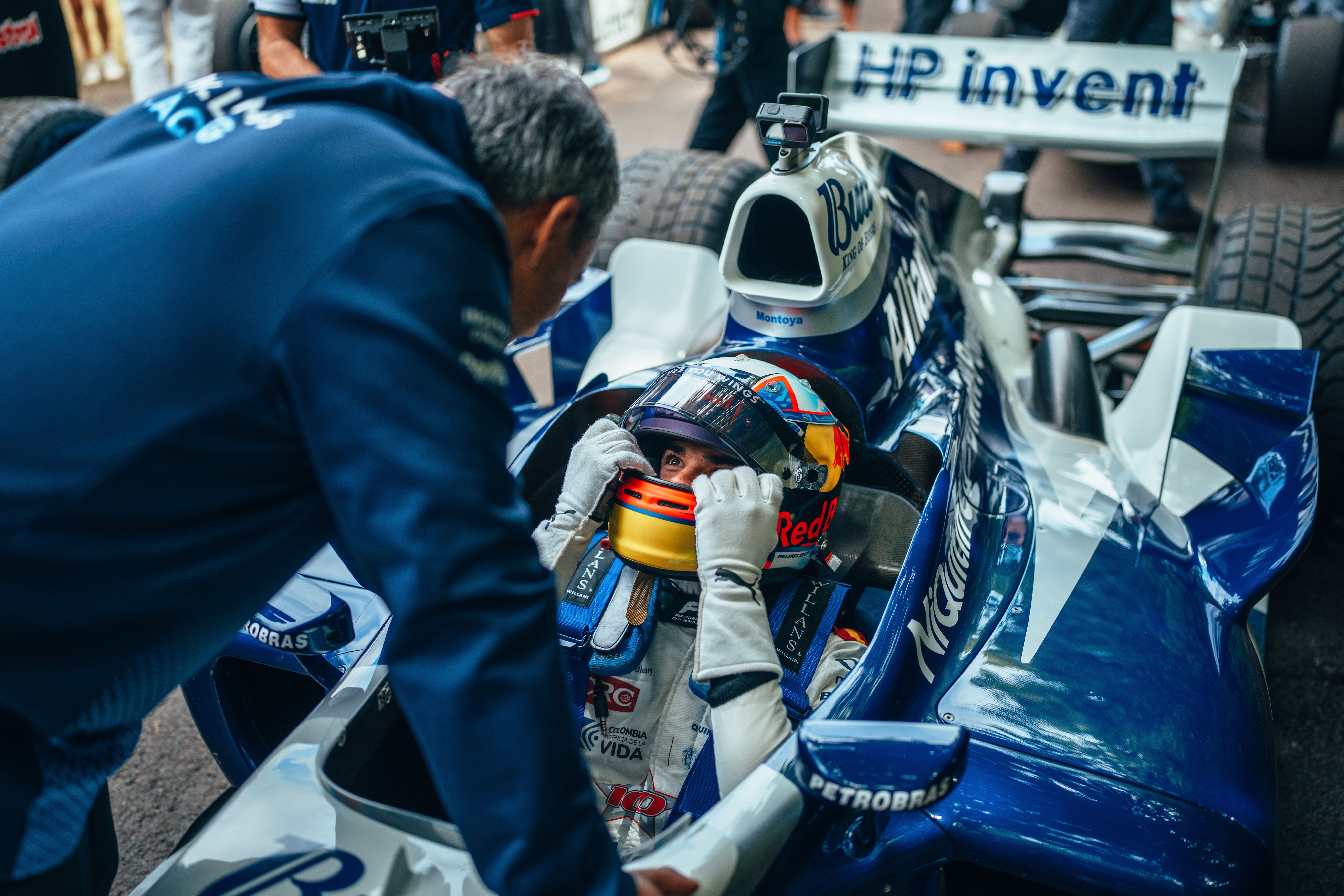 Meanwhile, Juan Pablo Montoya gives some words of advice to his son, Seb, before taking on the hill in the FW26.