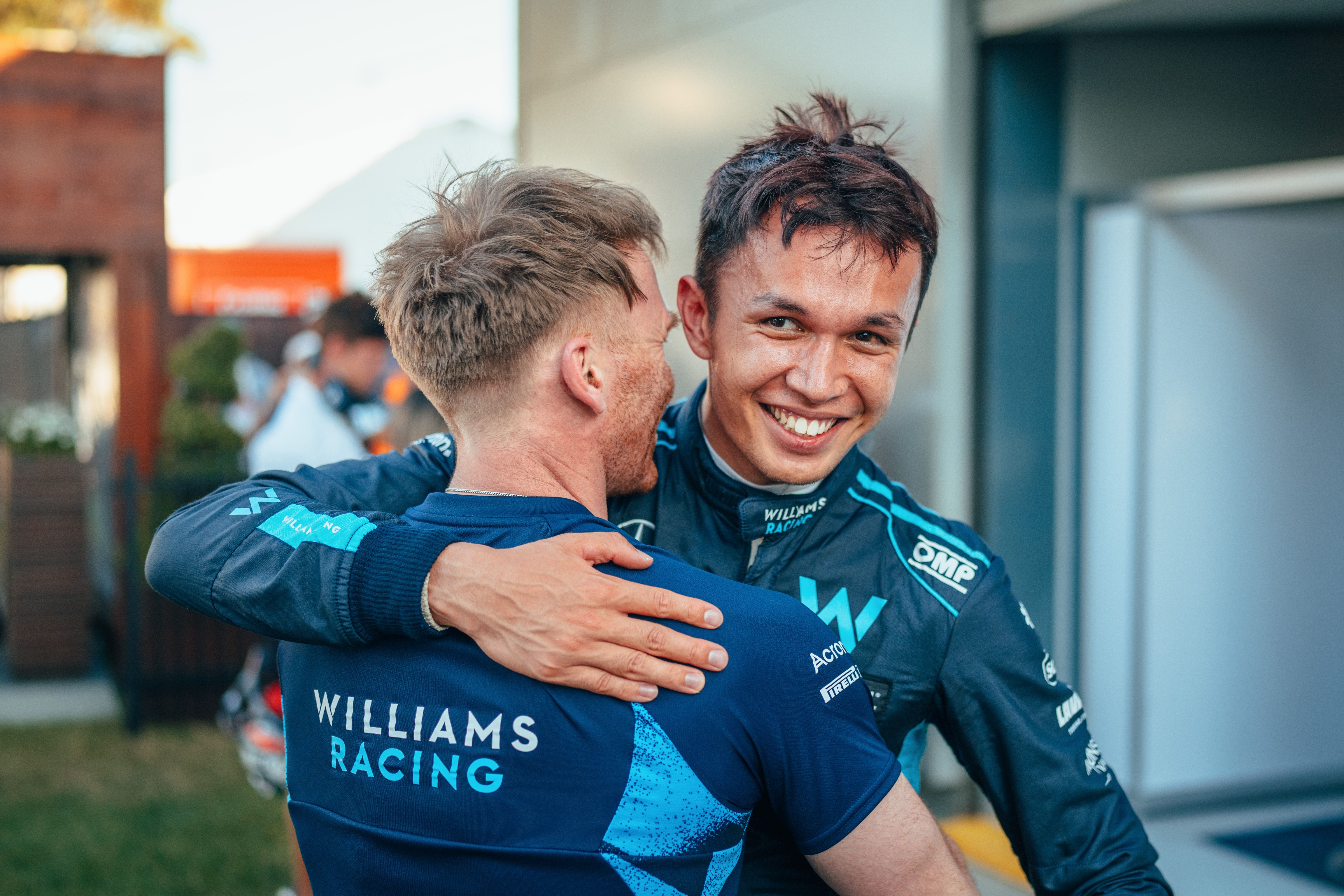 A congratulatory hug was waiting for him.