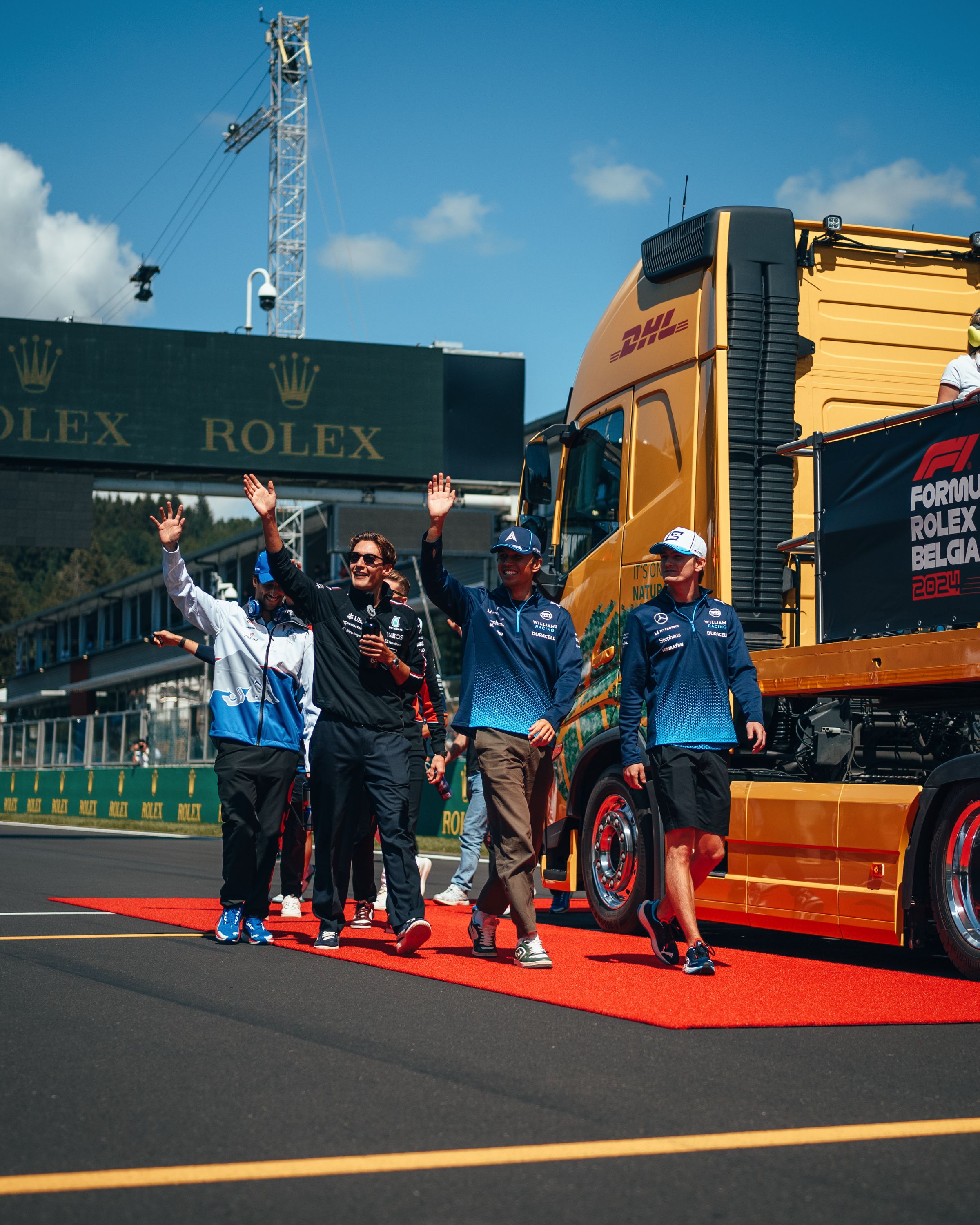 Alex and Logan make their way to the driver parade truck.