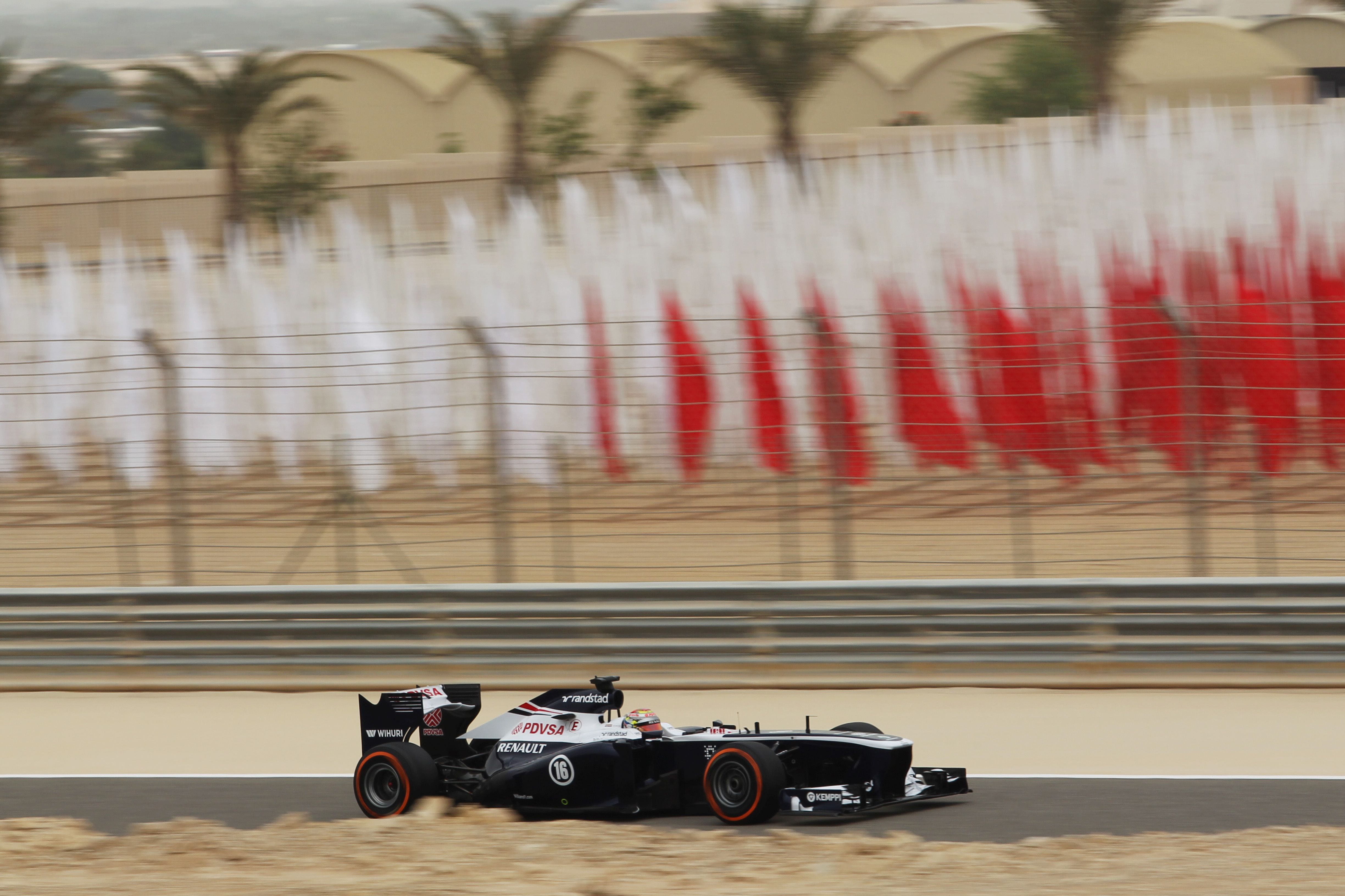 No time to admire the flags for Pastor Maldonado, 2013.