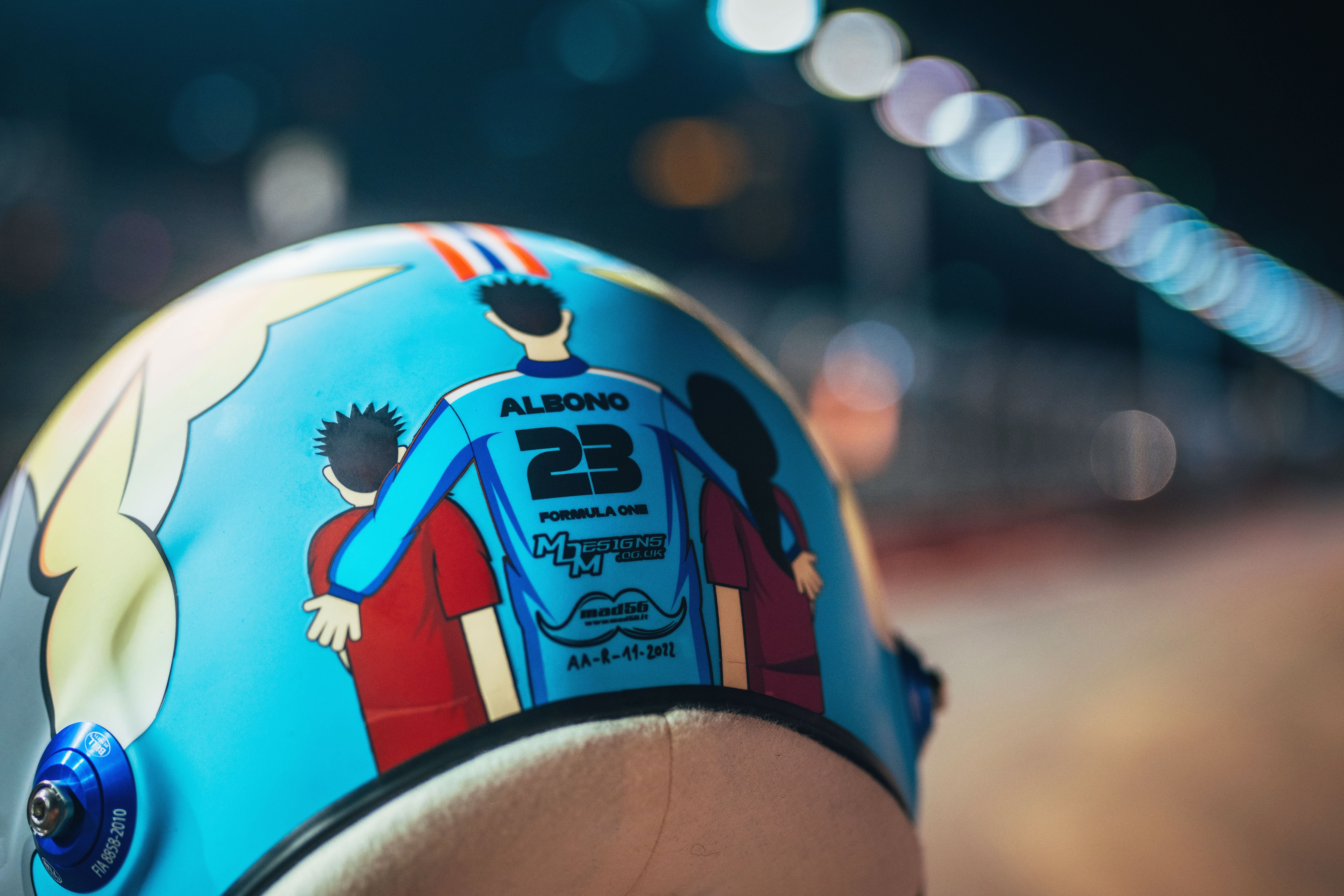 Alex visited the Wat Sakraeo orphanage earlier in the season and ended up coming away with red hair. He played football with some of the kids, and that’s been designed on the reverse.