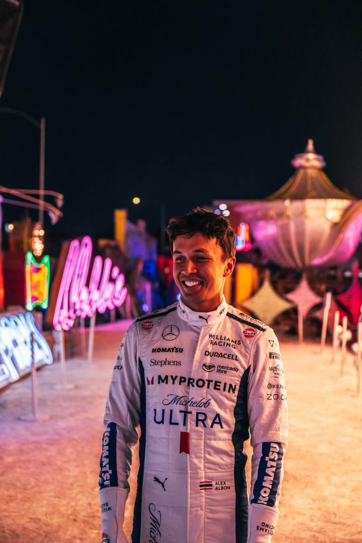 Alex basked in the glow of the Neon Museum last year