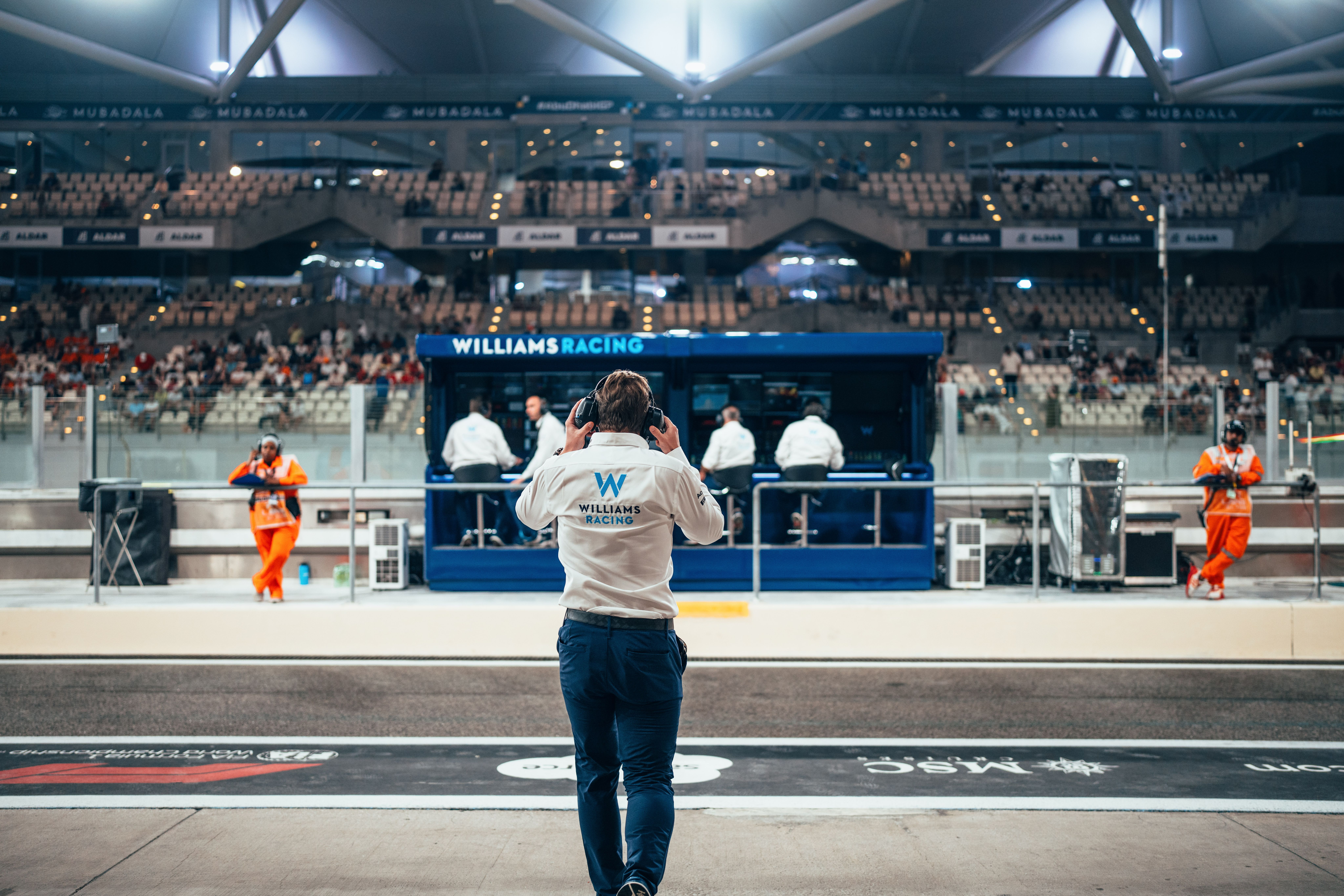 James makes the walk to the pit wall.
