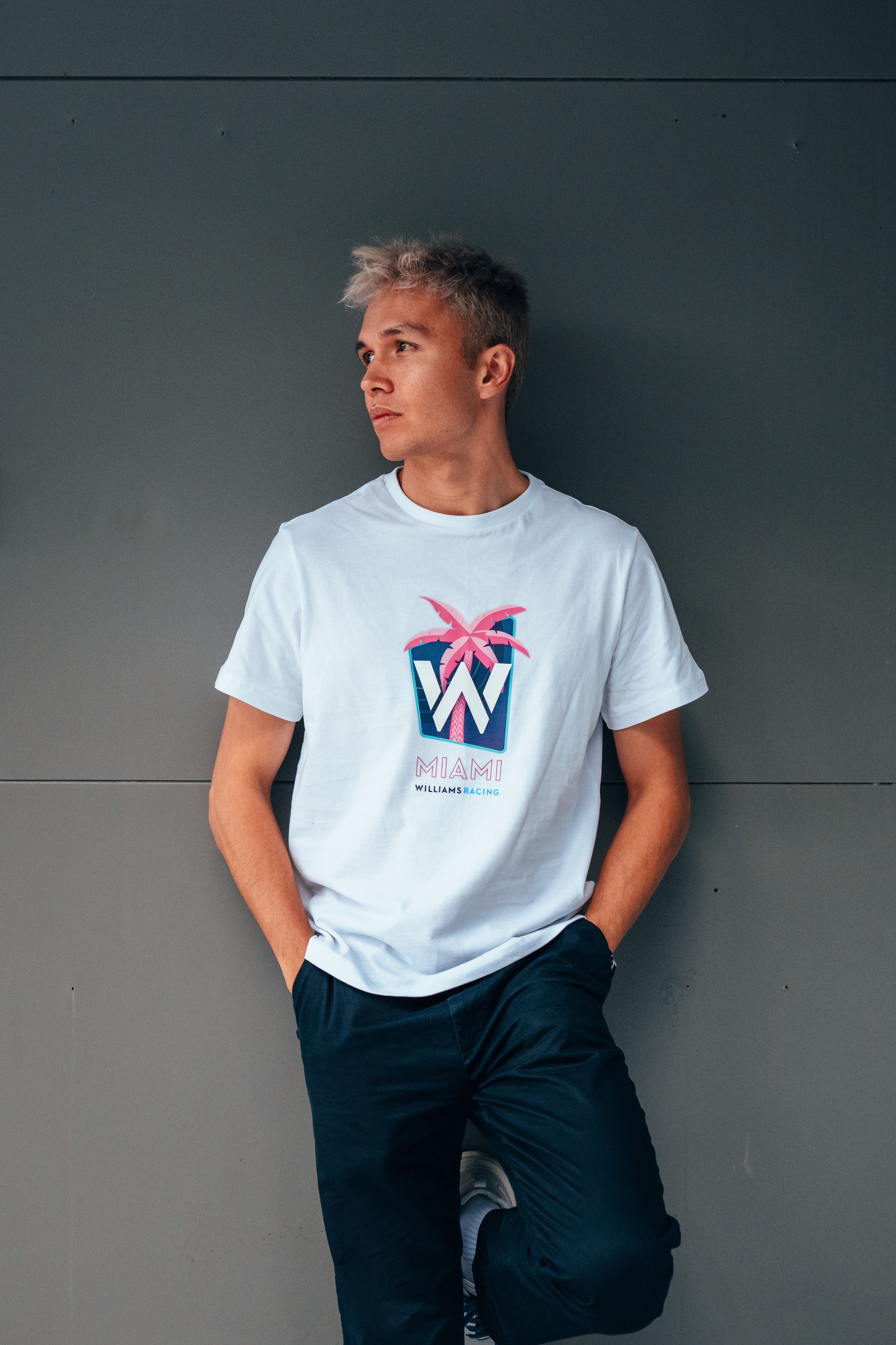 Alex absolutely rocks the white tee.